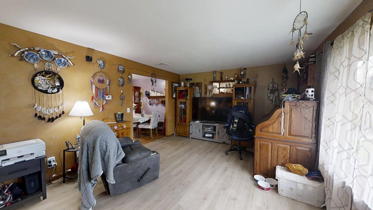 2308 Slayback Street Urbana, IL 61802 - Photo 6 of 37 a living room with furniture and a flat screen tv