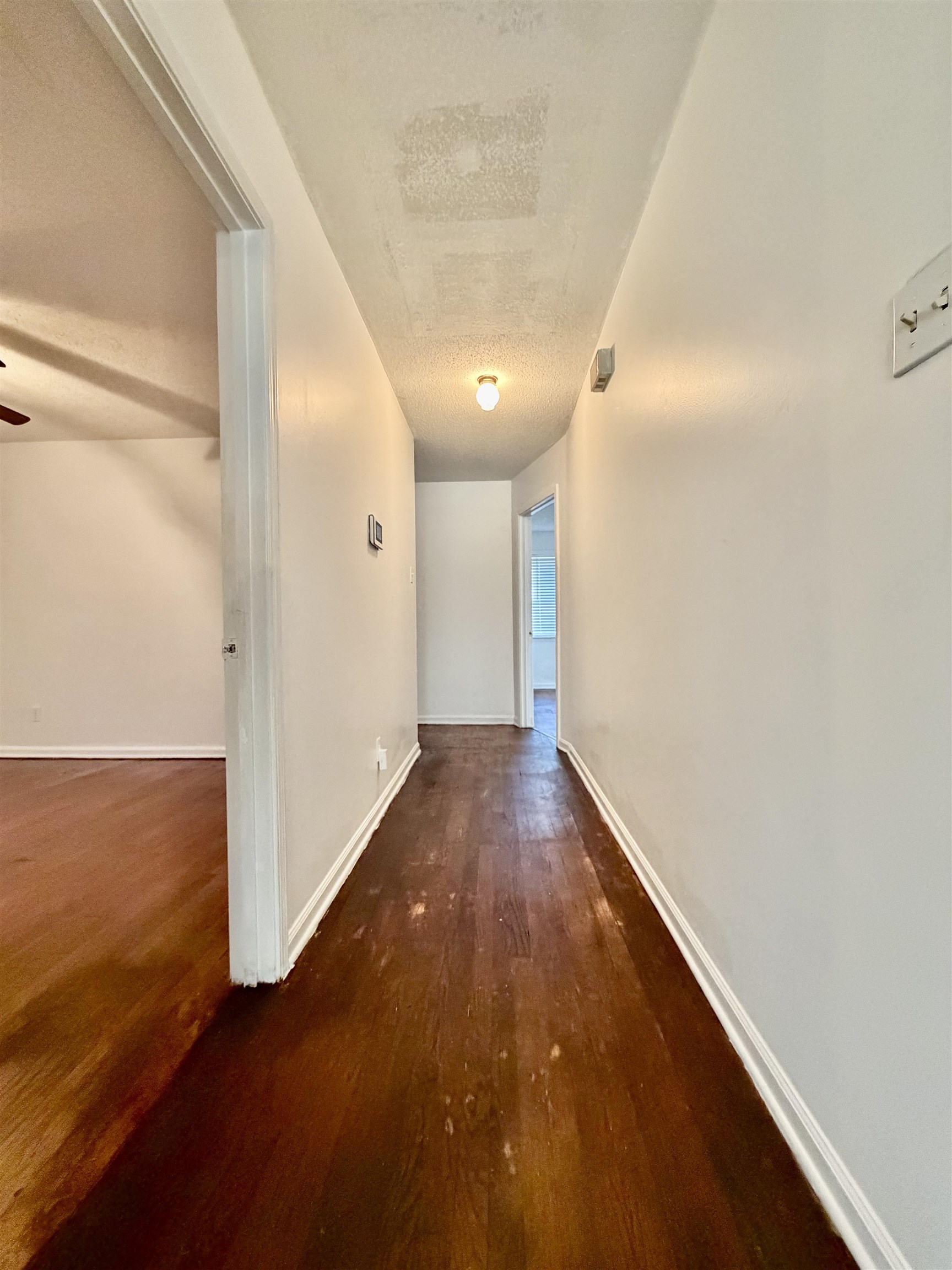 3179 Coleman Road Memphis, TN 38128 - Photo 11 of 22 a view of a hallway with wooden floor