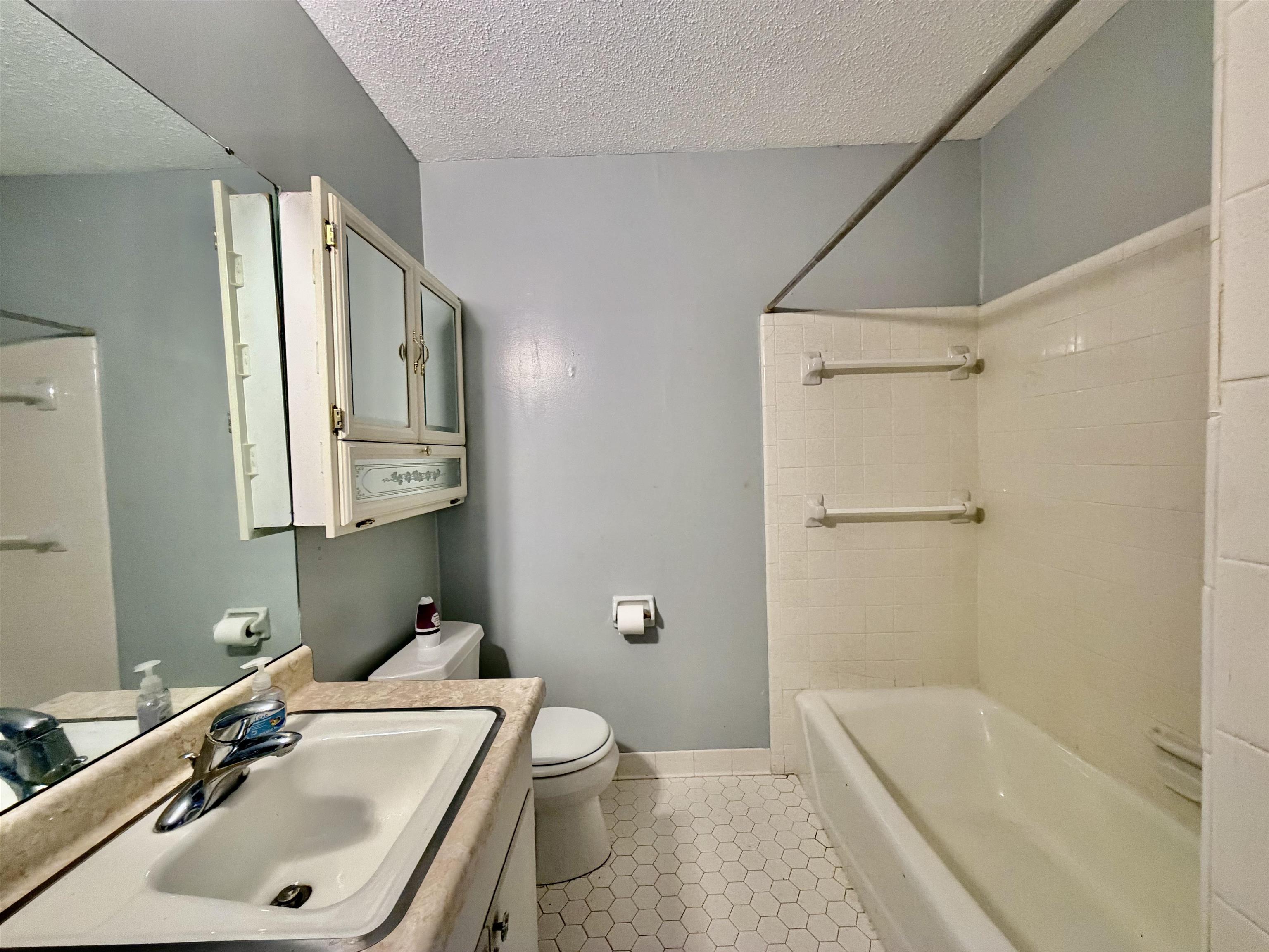 3179 Coleman Road Memphis, TN 38128 - Photo 17 of 22 a bathroom with a sink toilet and shower