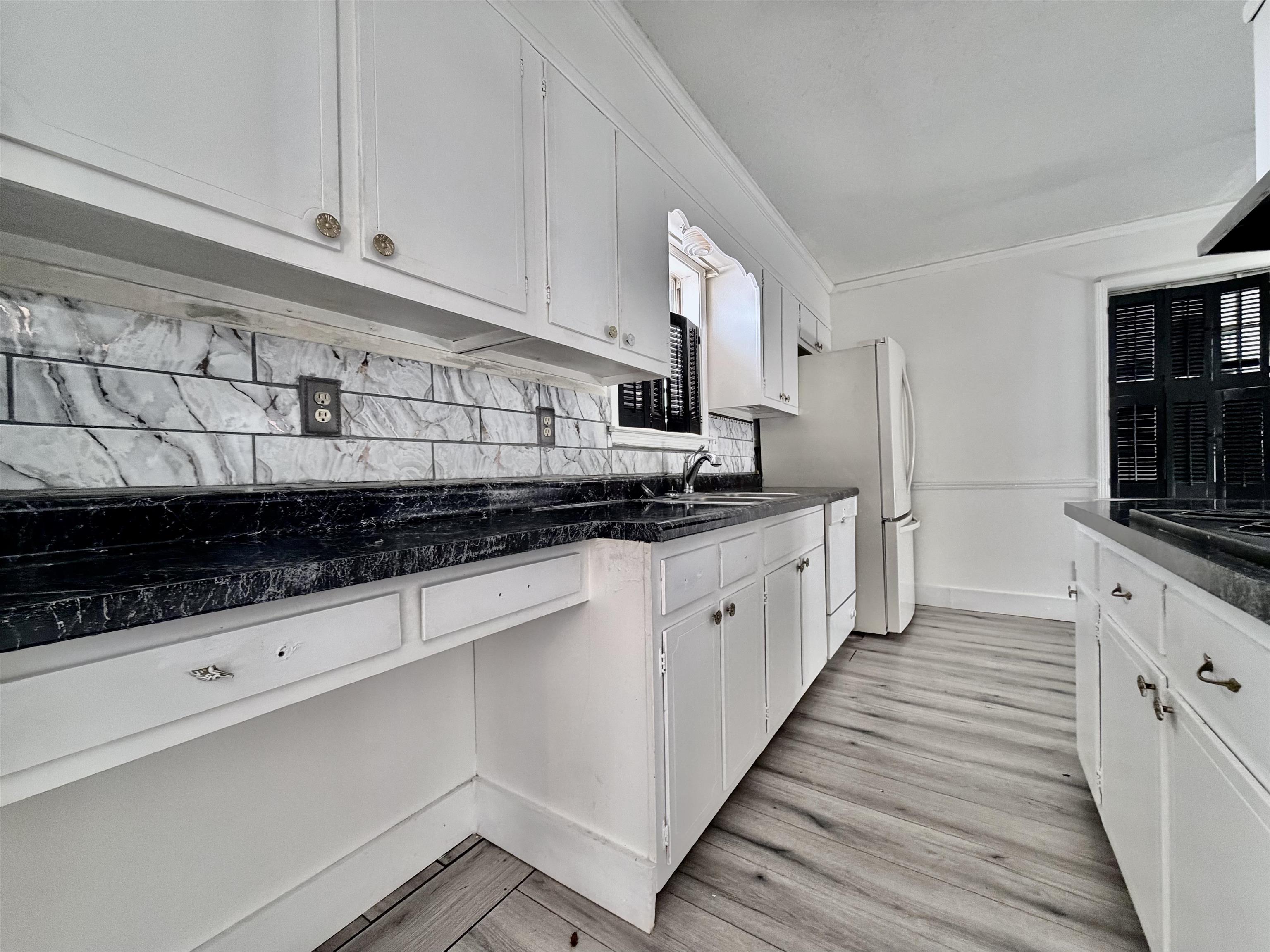 3179 Coleman Road Memphis, TN 38128 - Photo 20 of 22 a kitchen with stainless steel appliances a sink dishwasher a stove and a refrigerator