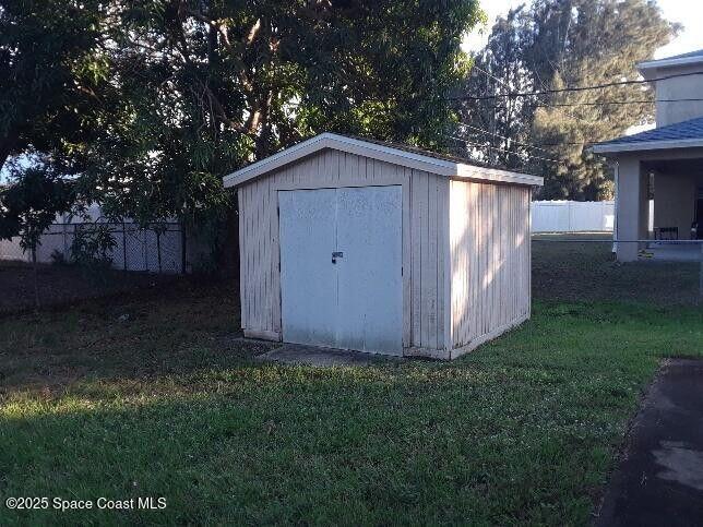1173 Scyphers Street Northeast Palm Bay, FL 32905 - Photo 18 of 22 Outdoor Storage