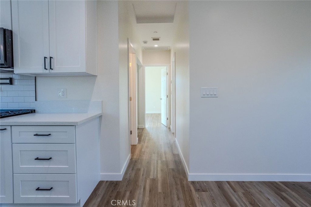 345 West 3rd Street, Unit A San Dimas, CA 91773 - Photo 6 of 12 a view of hallway with wooden floor