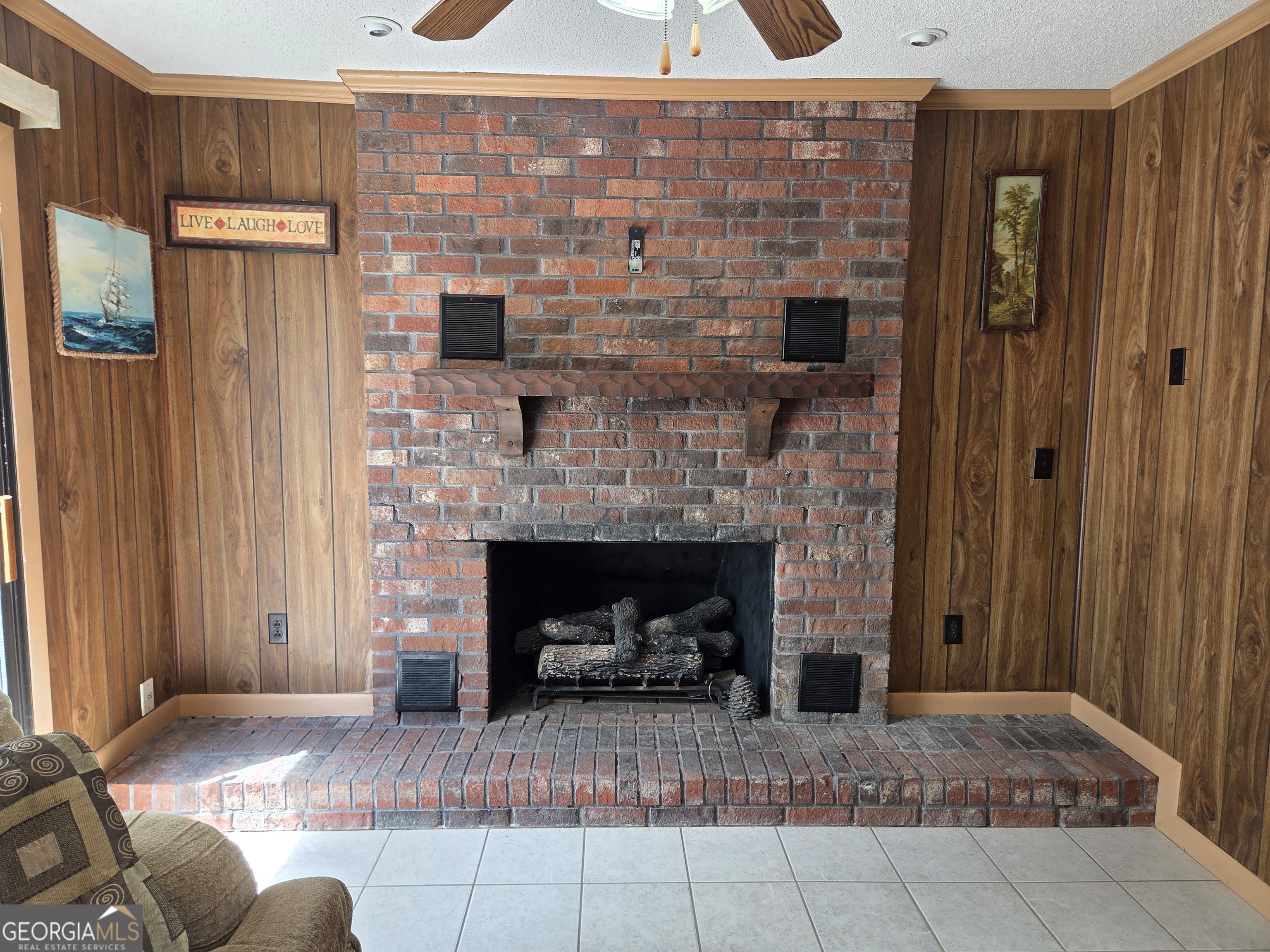 674 McNatt Falls Road Uvalda, GA 30473 - Photo 12 of 58 a living room with furniture and a fireplace