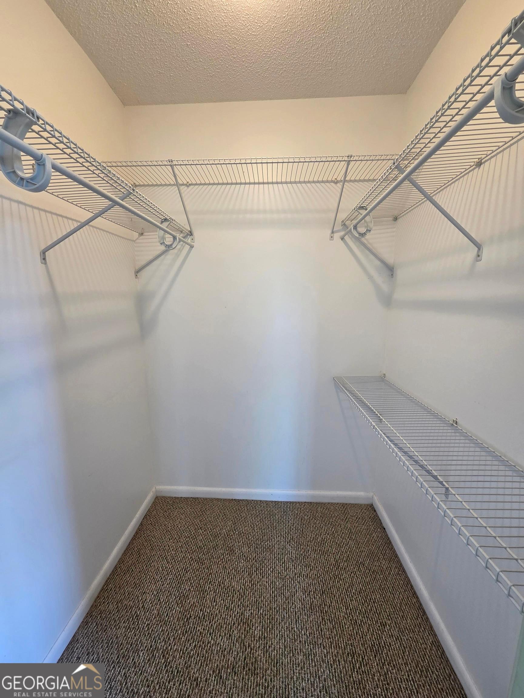 674 McNatt Falls Road Uvalda, GA 30473 - Photo 32 of 58 a view of a room with racks on the wall