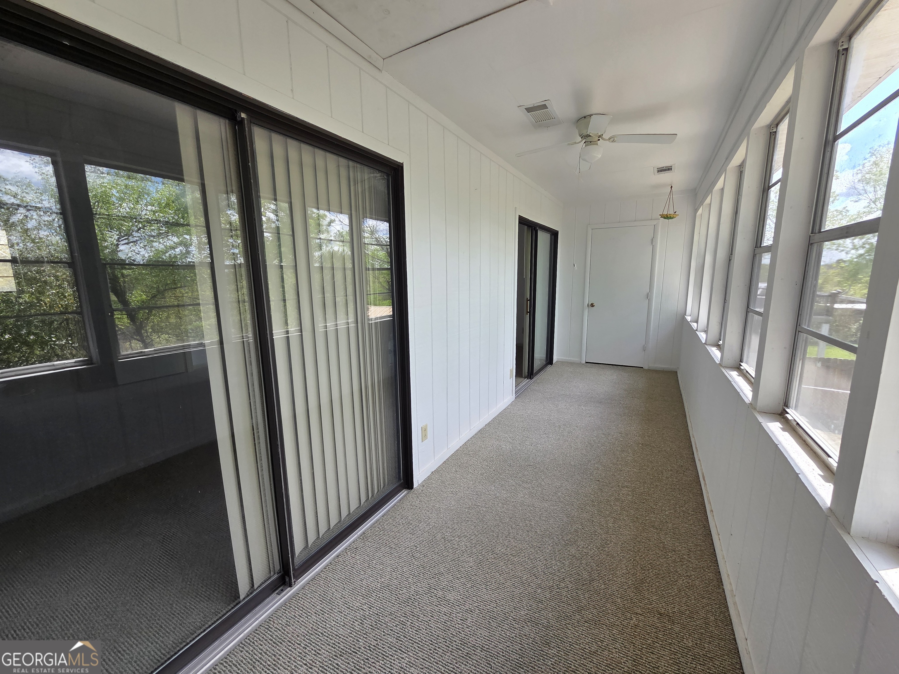 674 McNatt Falls Road Uvalda, GA 30473 - Photo 35 of 58 a view of a big room with windows