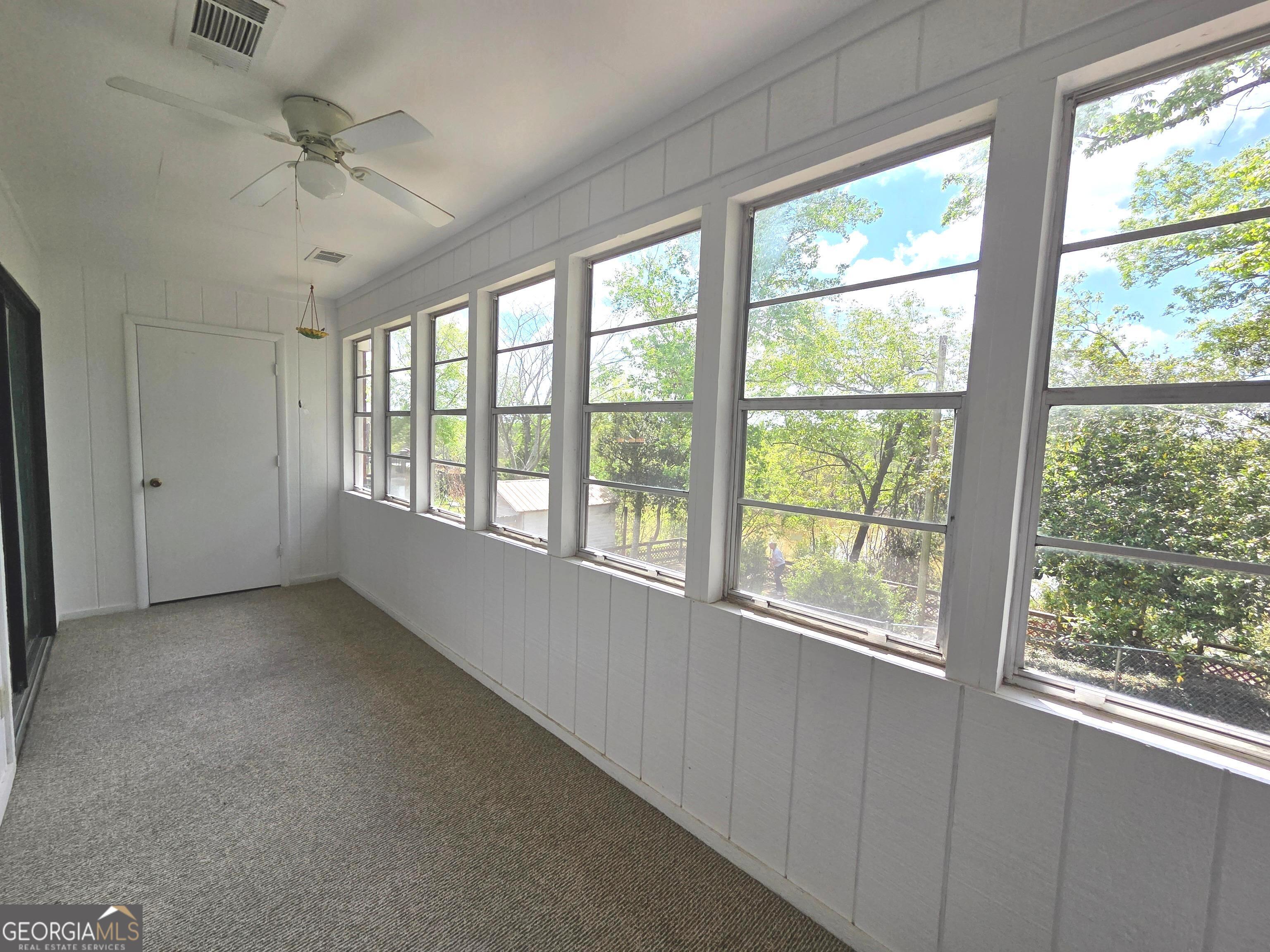 674 McNatt Falls Road Uvalda, GA 30473 - Photo 36 of 58 a view of an empty room with a window
