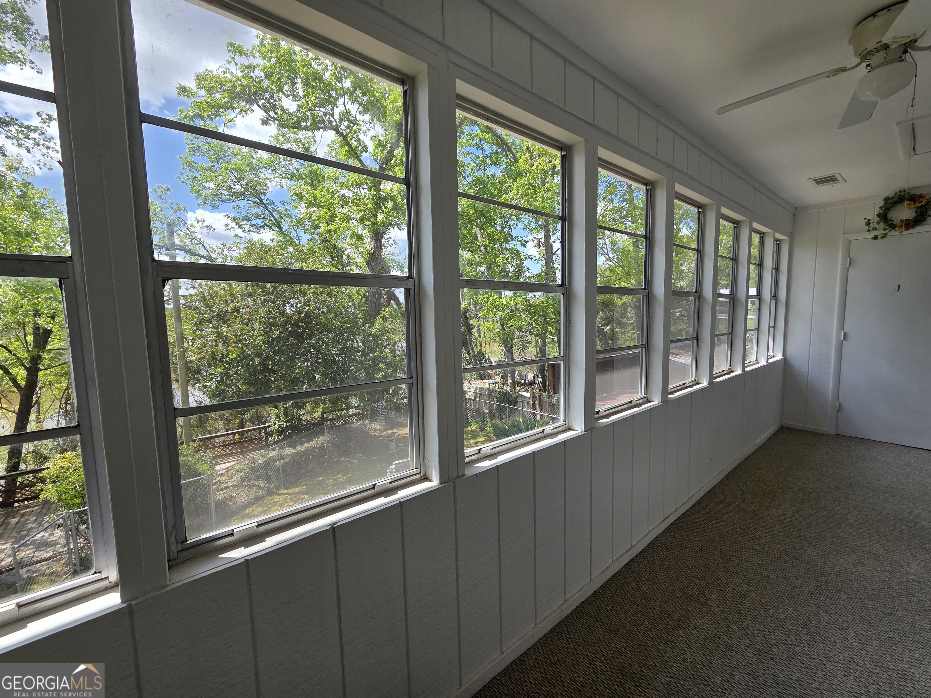 674 McNatt Falls Road Uvalda, GA 30473 - Photo 37 of 58 a view of an empty room with a window
