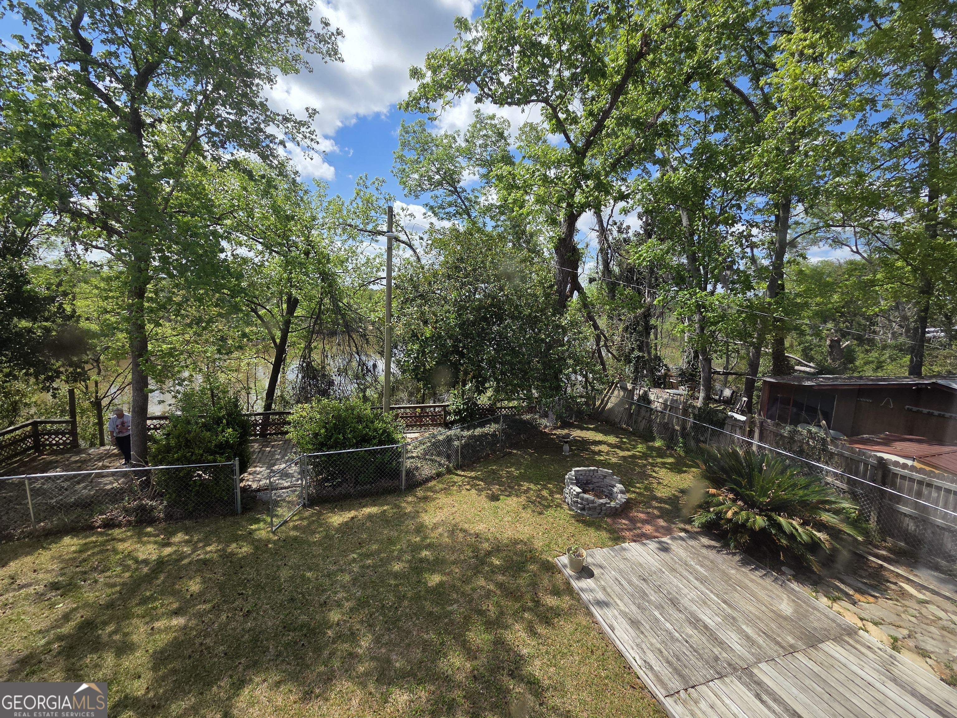 674 McNatt Falls Road Uvalda, GA 30473 - Photo 39 of 58 a backyard of a house with lots of green space