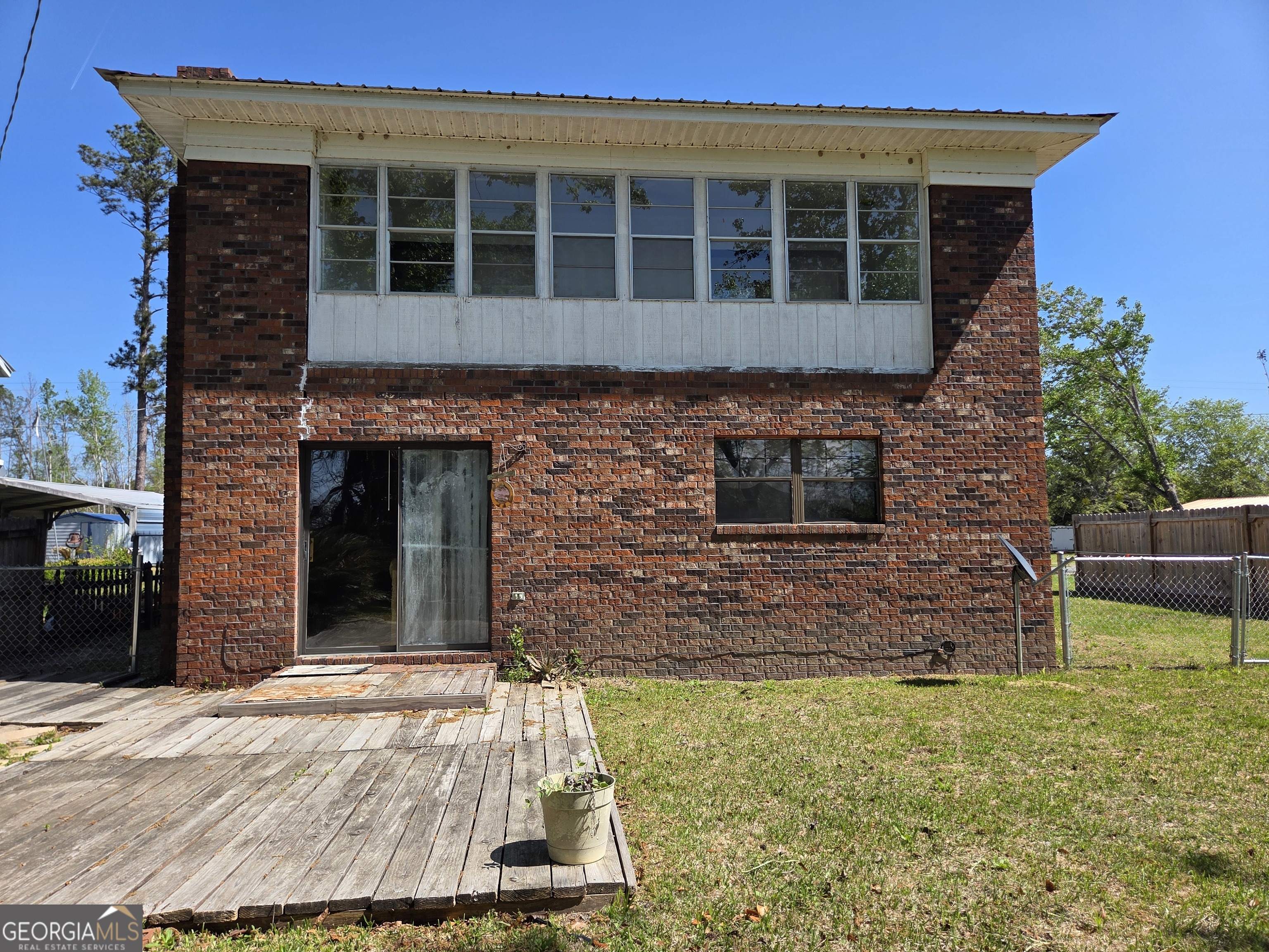 674 McNatt Falls Road Uvalda, GA 30473 - Photo 42 of 58 a front view of a house with a yard