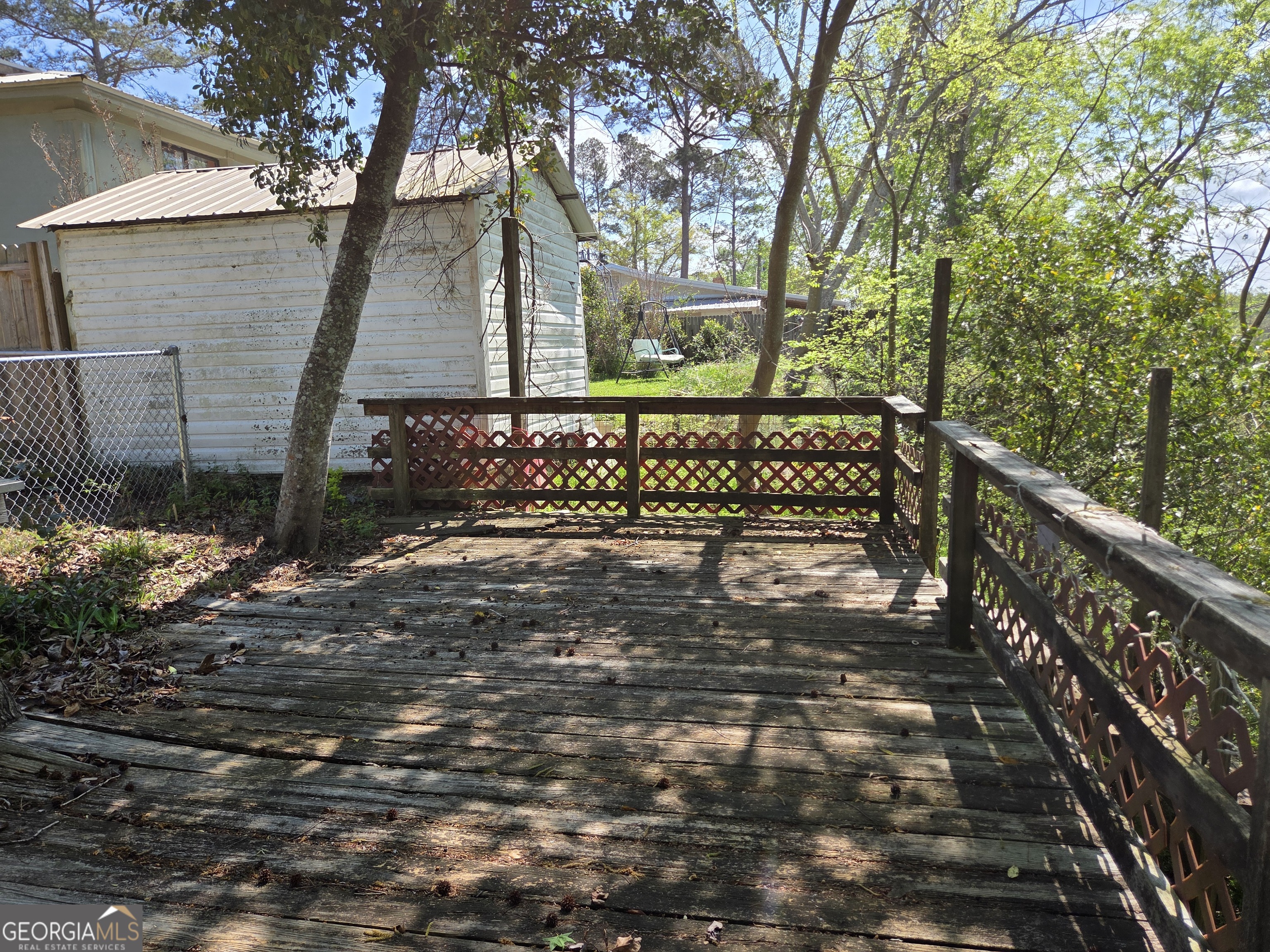 674 McNatt Falls Road Uvalda, GA 30473 - Photo 50 of 58 a view of house with a bench