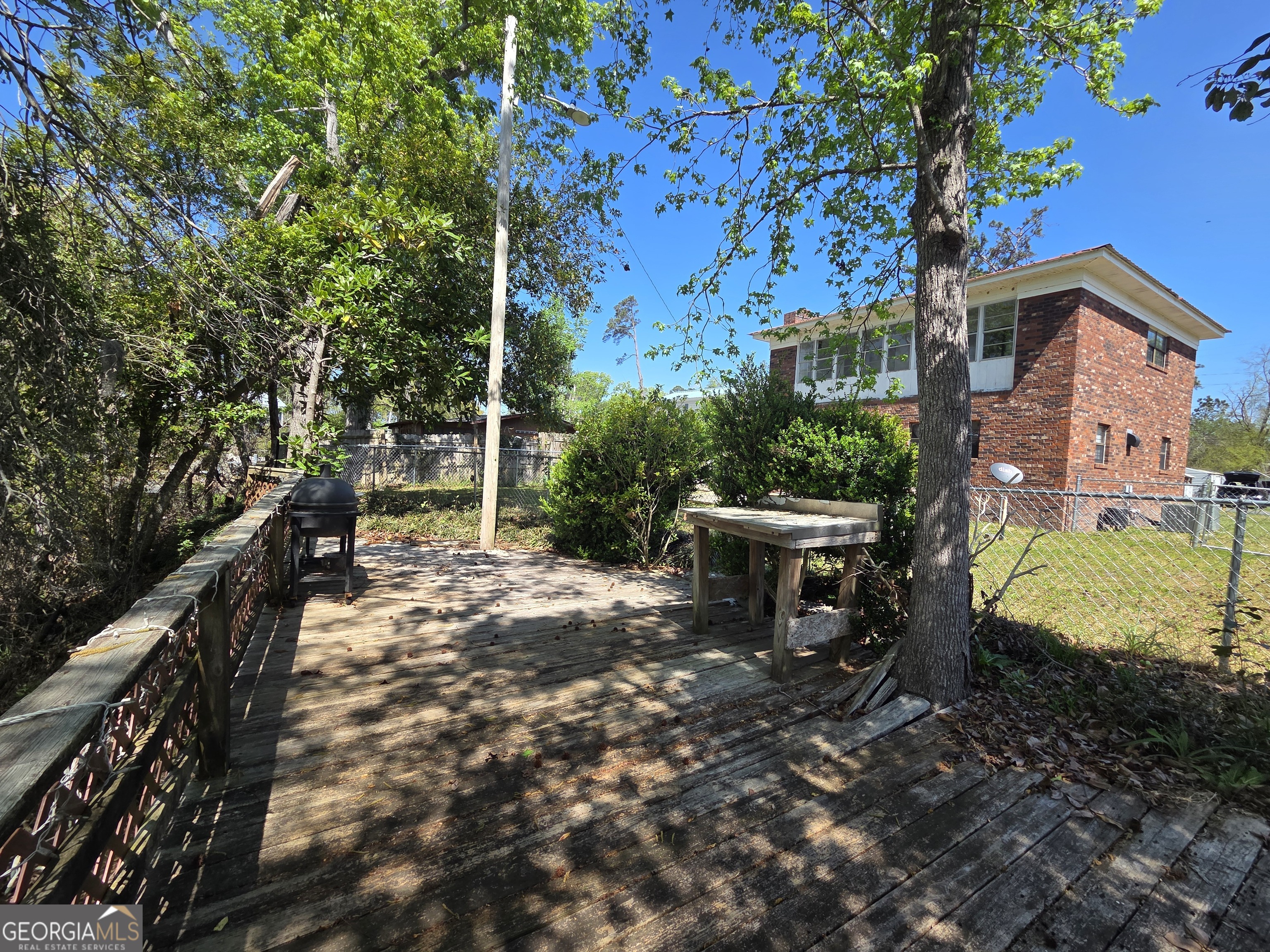 674 McNatt Falls Road Uvalda, GA 30473 - Photo 51 of 58 a view of a house with backyard and a patio