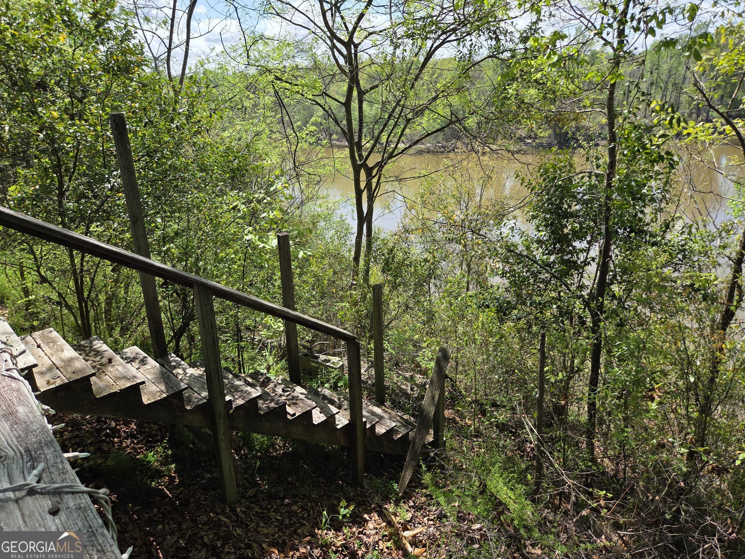 674 McNatt Falls Road Uvalda, GA 30473 - Photo 53 of 58 a view of a balcony with wooden floor