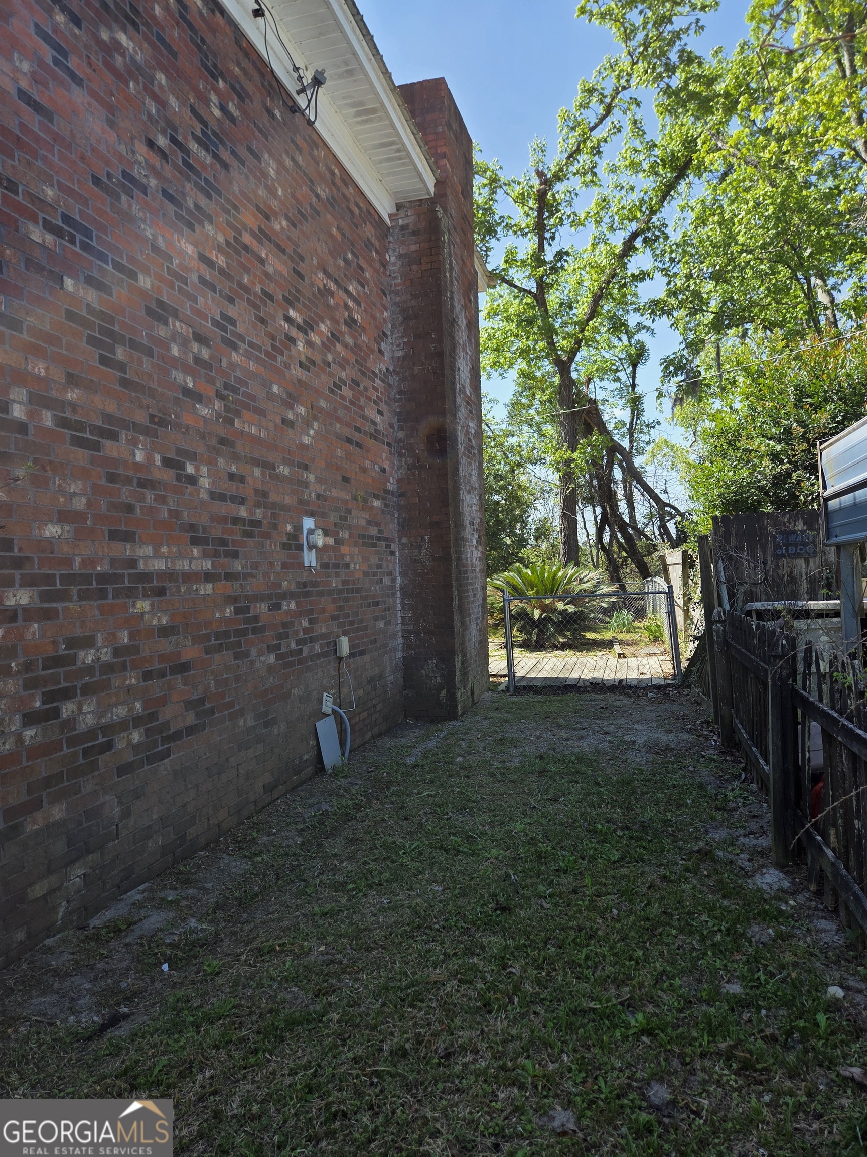 674 McNatt Falls Road Uvalda, GA 30473 - Photo 55 of 58 a backyard of a house with lots of green space