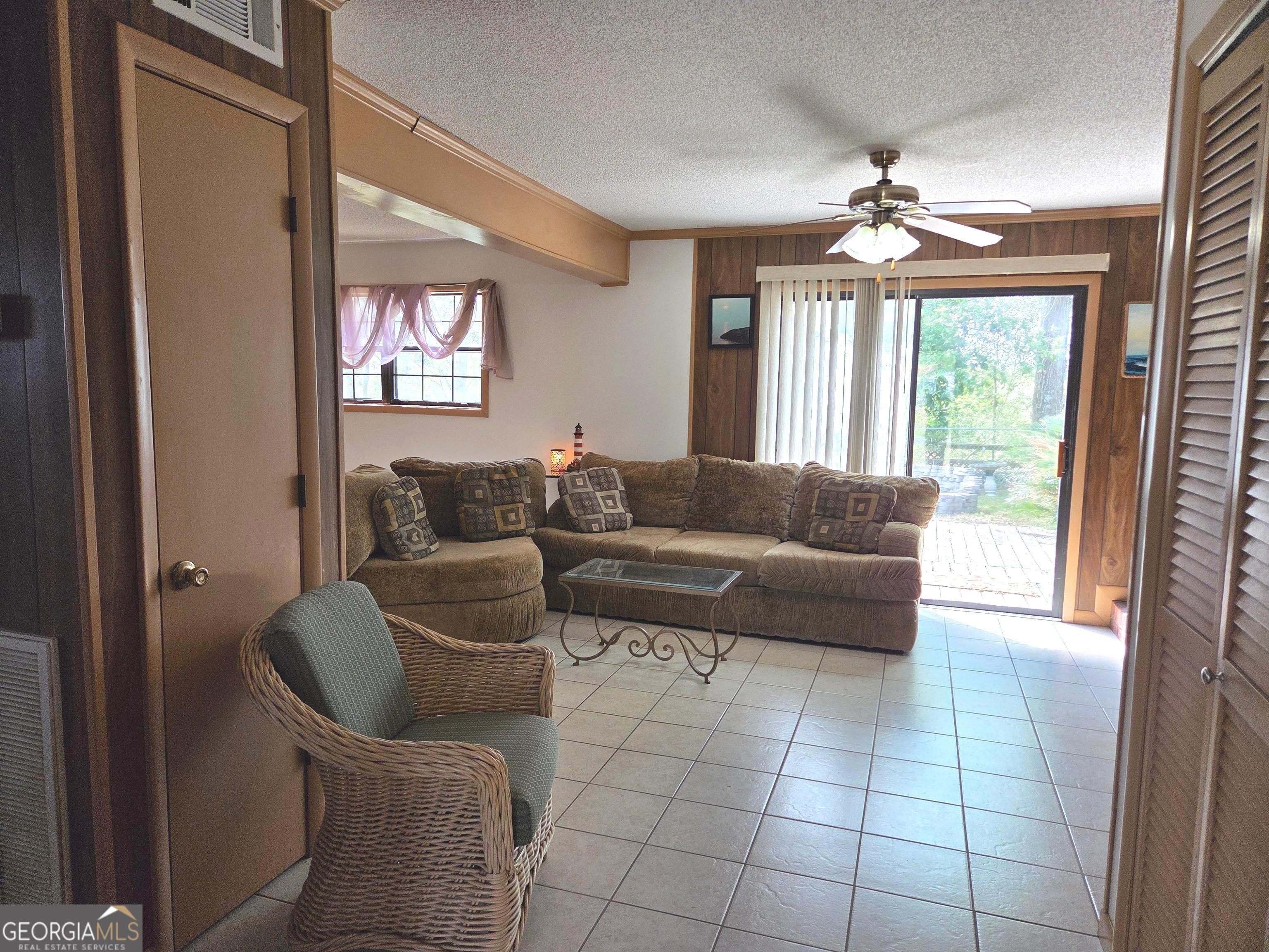 674 McNatt Falls Road Uvalda, GA 30473 - Photo 8 of 58 a living room with furniture and a large window