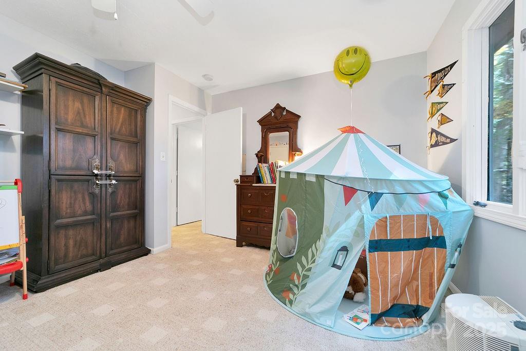 109 Rocky Hill Overlook Road Brevard, NC 28712 - Photo 33 of 41 a view of a bedroom and wooden floor