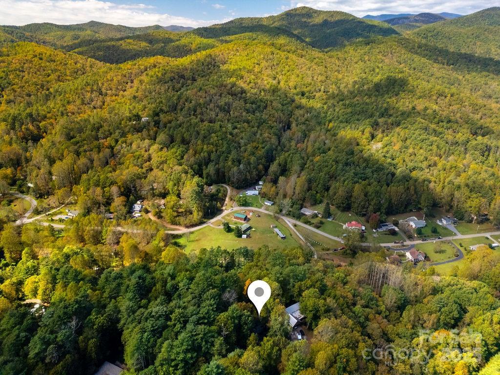 109 Rocky Hill Overlook Road Brevard, NC 28712 - Photo 40 of 41 a view of a lake with mountains in the background