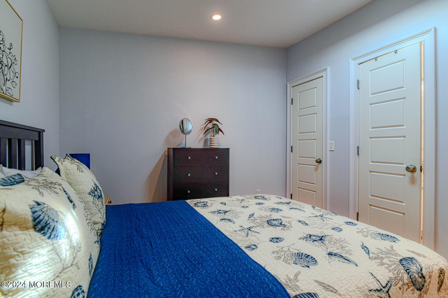 94 Clark Avenue Ocean Grove, NJ 07756 - Photo 16 of 29 a bedroom with a bed and a dresser