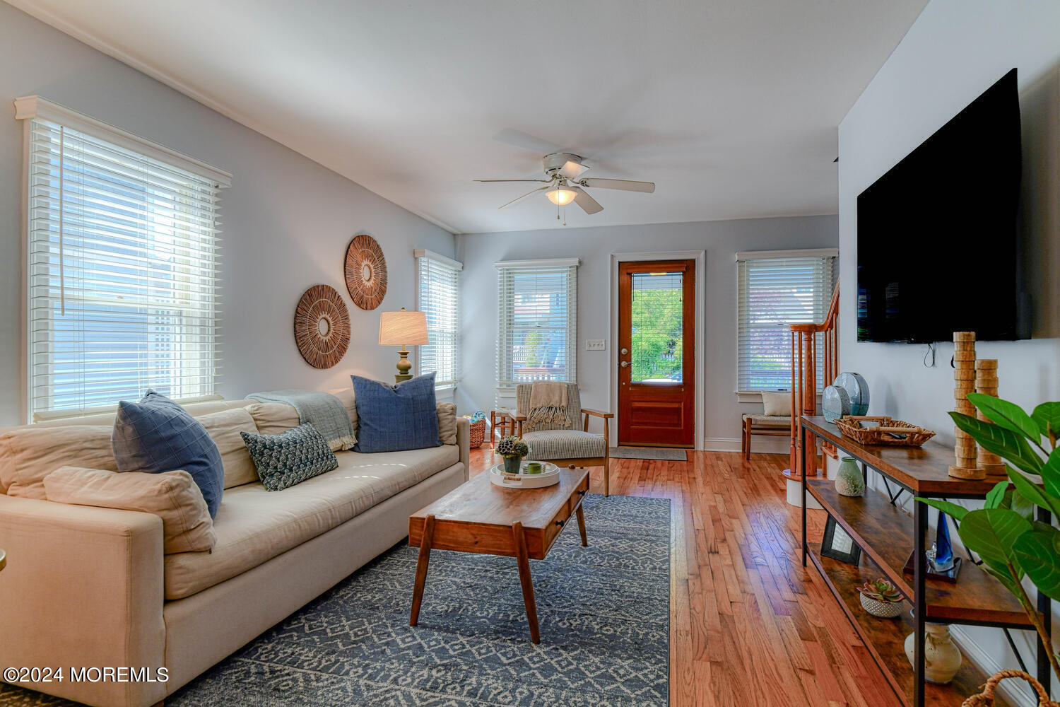 94 Clark Avenue Ocean Grove, NJ 07756 - Photo 9 of 29 a living room with furniture and a flat screen tv