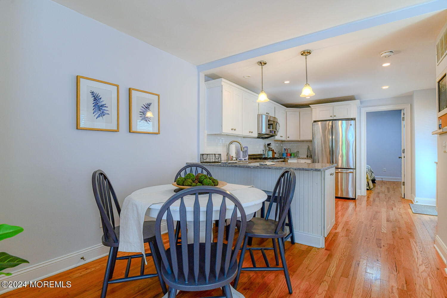 94 Clark Avenue Ocean Grove, NJ 07756 - Photo 10 of 29 a view of a dining room with furniture and wooden floor