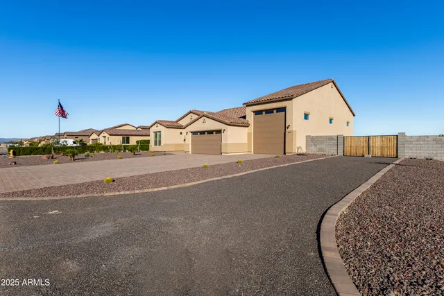 a view of a house with a street