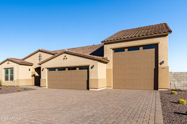 a view of a house with a street