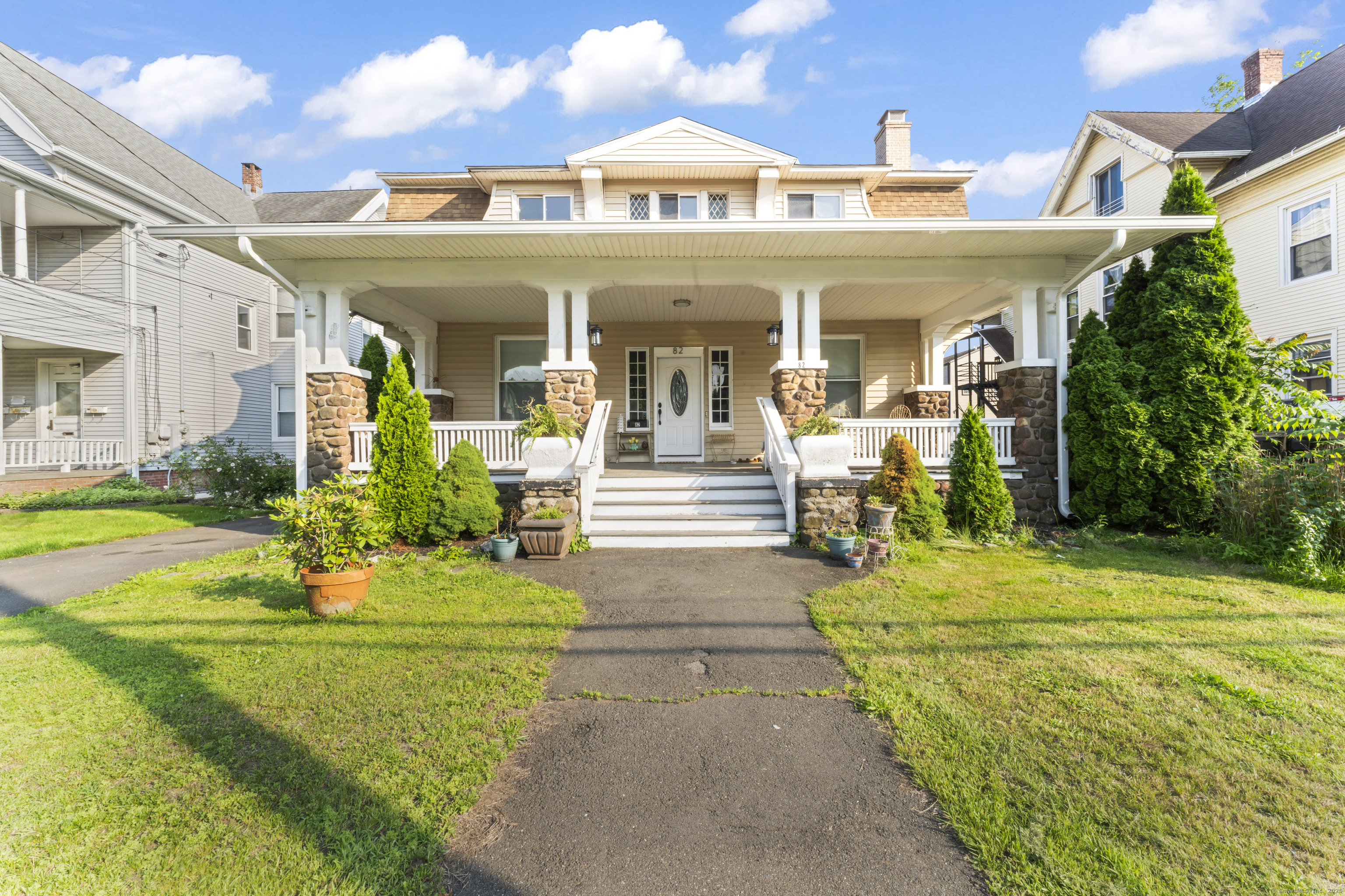 a front view of a house with swimming pool