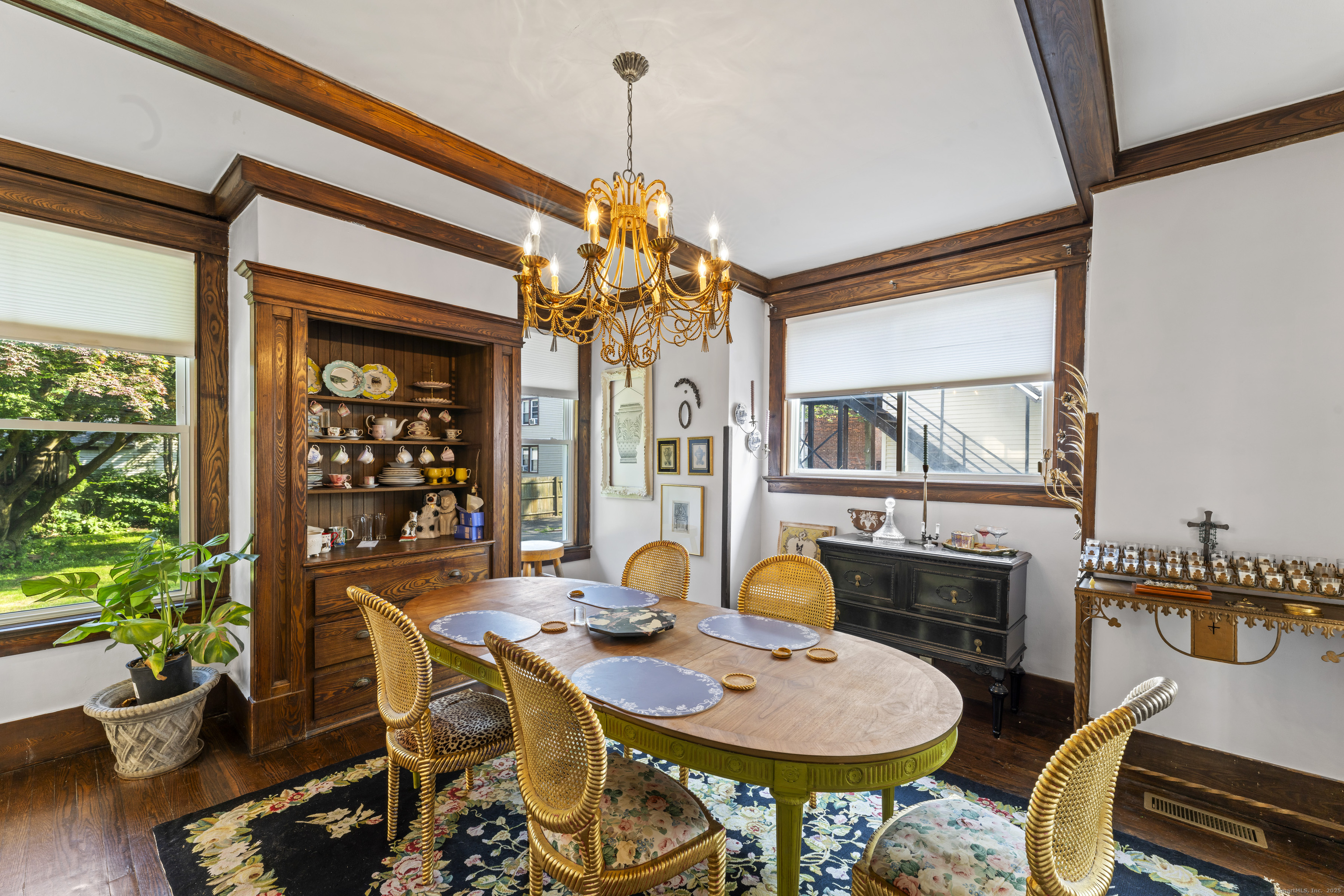 82 Main Street West Haven, CT 06516 - Photo 11 of 40 a dining room with furniture a window and wooden floor