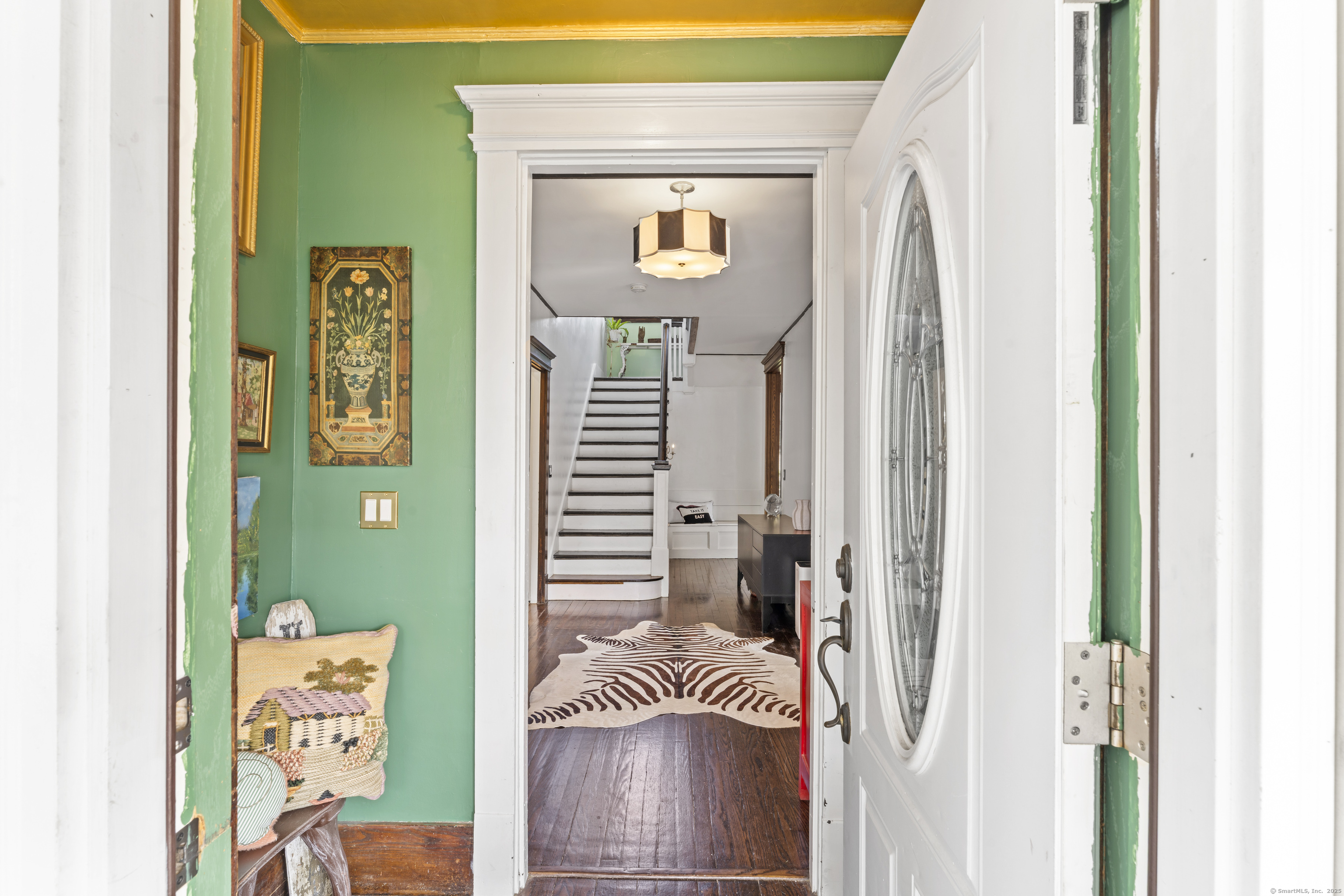 82 Main Street West Haven, CT 06516 - Photo 6 of 40 a front view of a house with entryway
