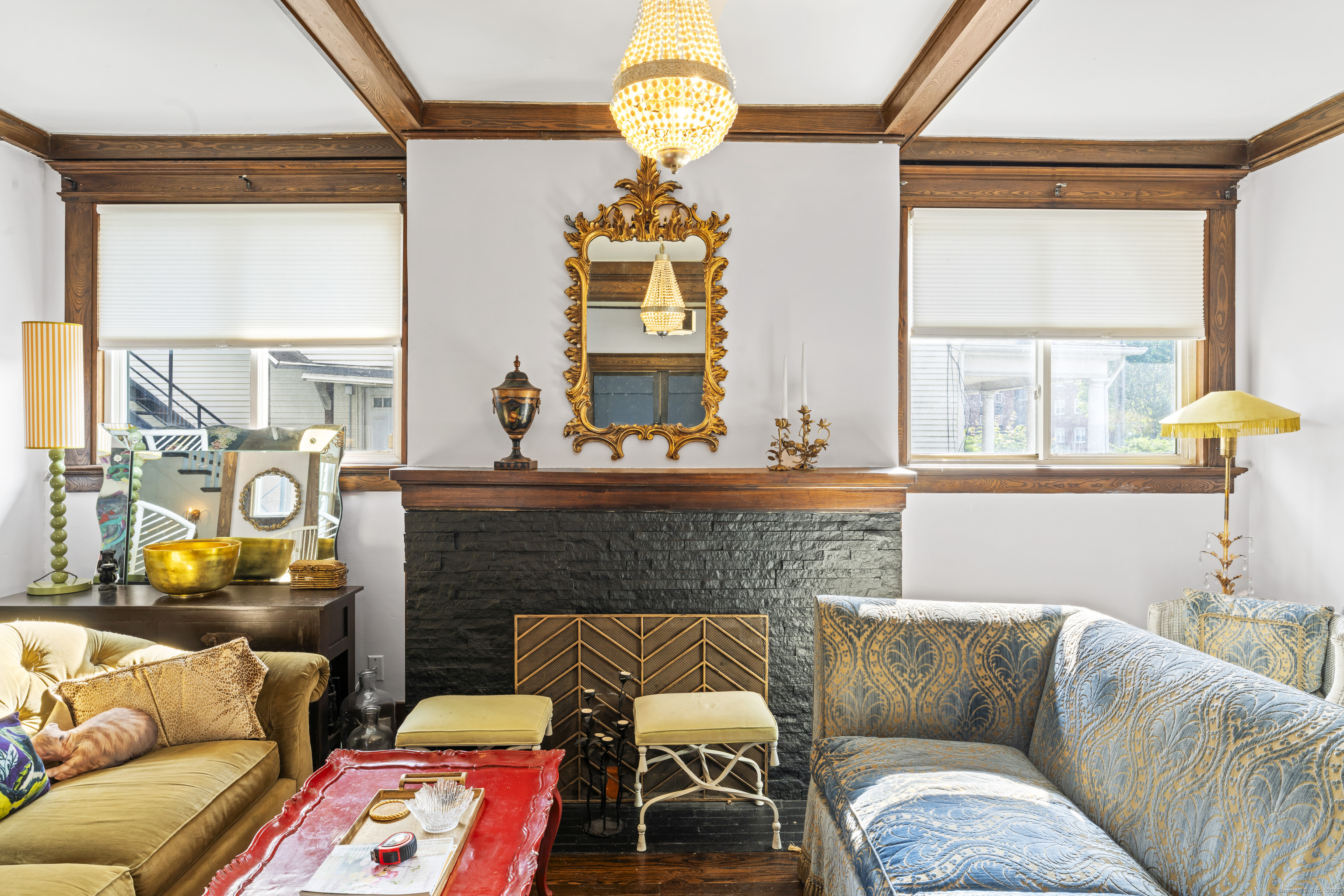 82 Main Street West Haven, CT 06516 - Photo 7 of 40 a living room with furniture and a window