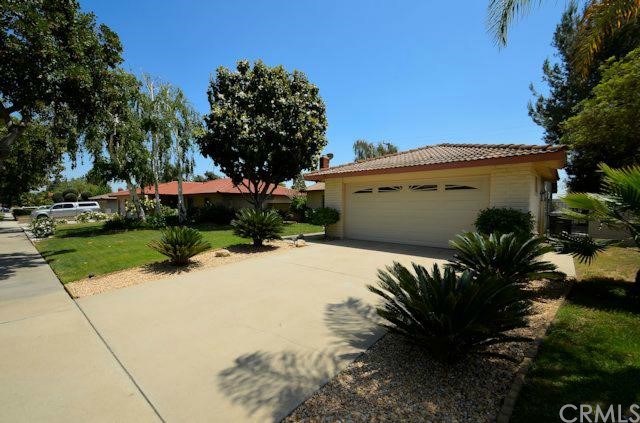 8629 Hamilton Street Rancho Cucamonga, CA 91701 - Photo 1 of 1 Beautiful mature landscaping in the front.