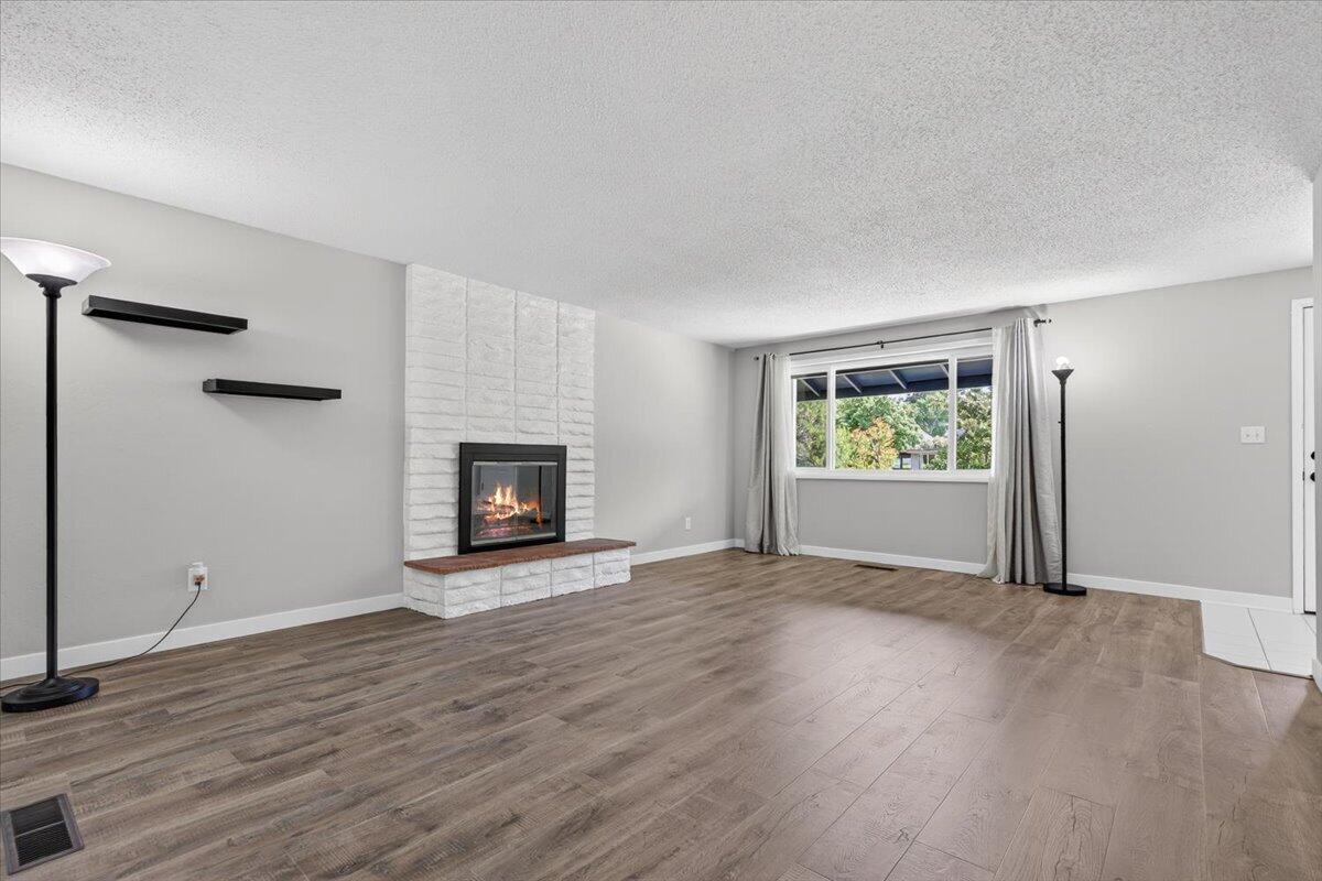 309 North Berkeley Way Medford, OR 97504 - Photo 8 of 32 New vinyl plank throughout