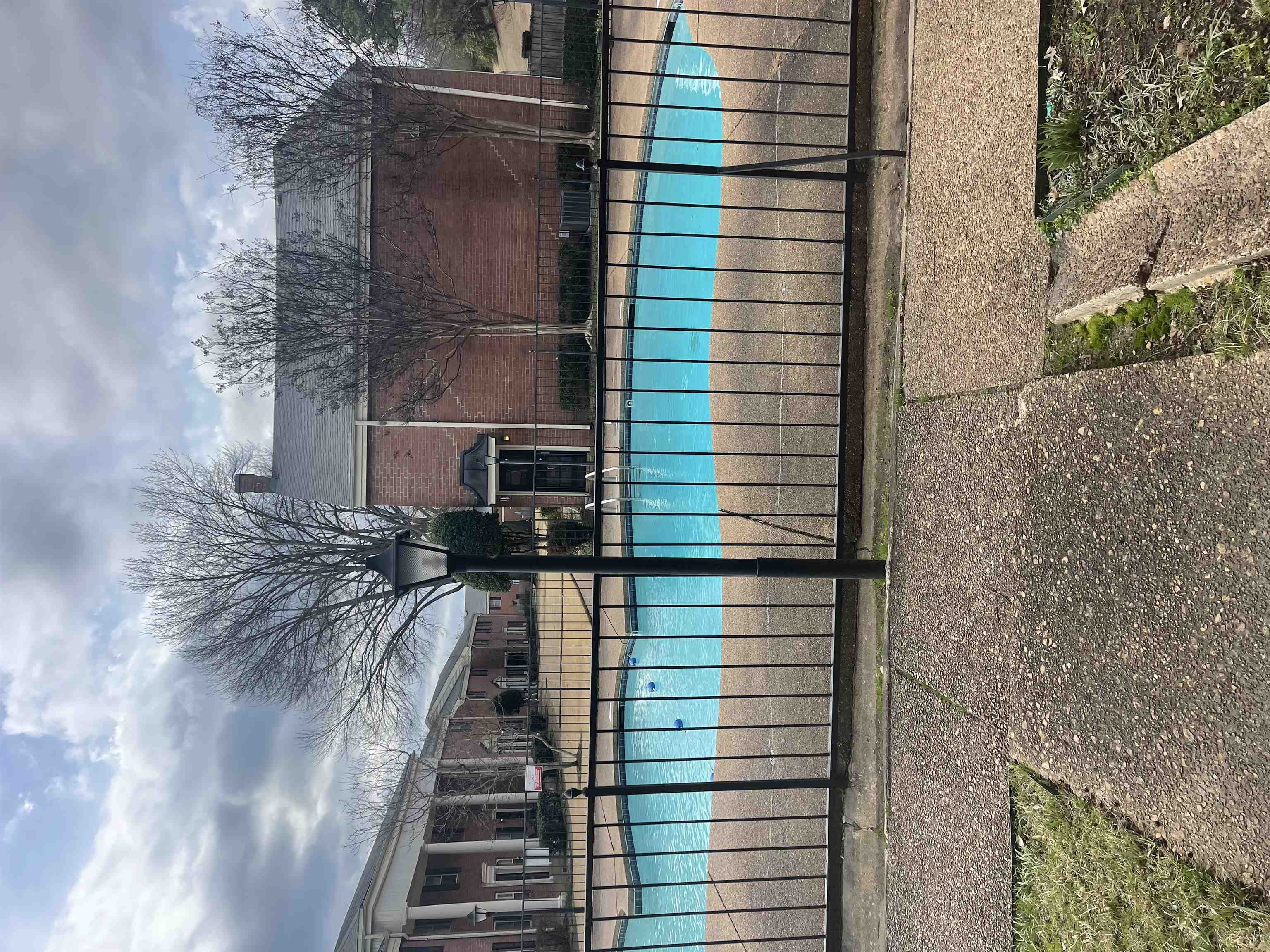 5718 Quince Road, Unit 1 Memphis, TN 38119 - Photo 3 of 17 a view of a house with a backyard