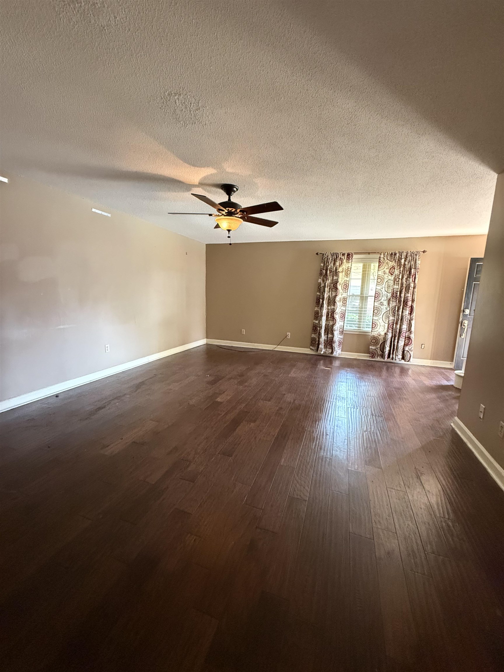 5718 Quince Road, Unit 1 Memphis, TN 38119 - Photo 6 of 17 a view of a room with wooden floor
