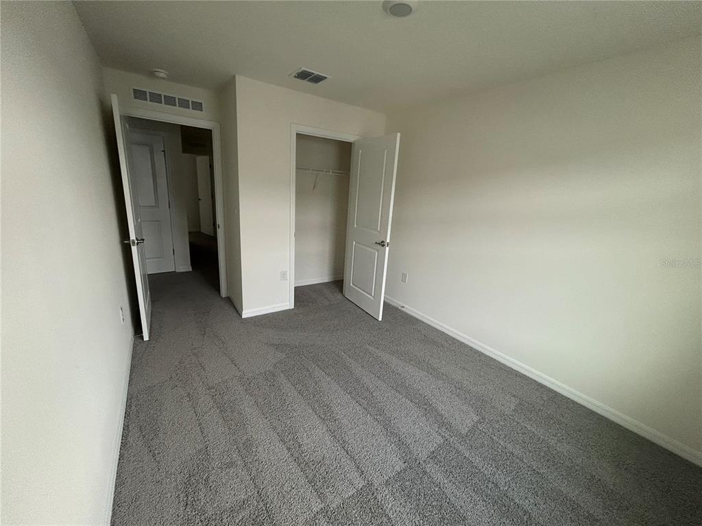 6582 South W 81st Loop Ocala, FL 34476 - Photo 10 of 12 a view of a room with wooden floor