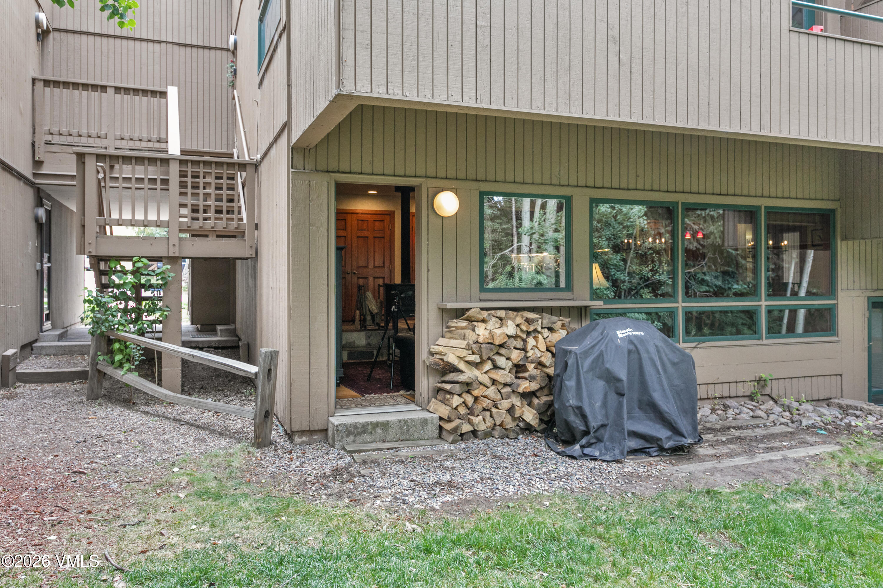 3911 Big Horn Road, Unit 1B Vail, CO 81657 - Photo 18 of 29 a front view of a house with garden
