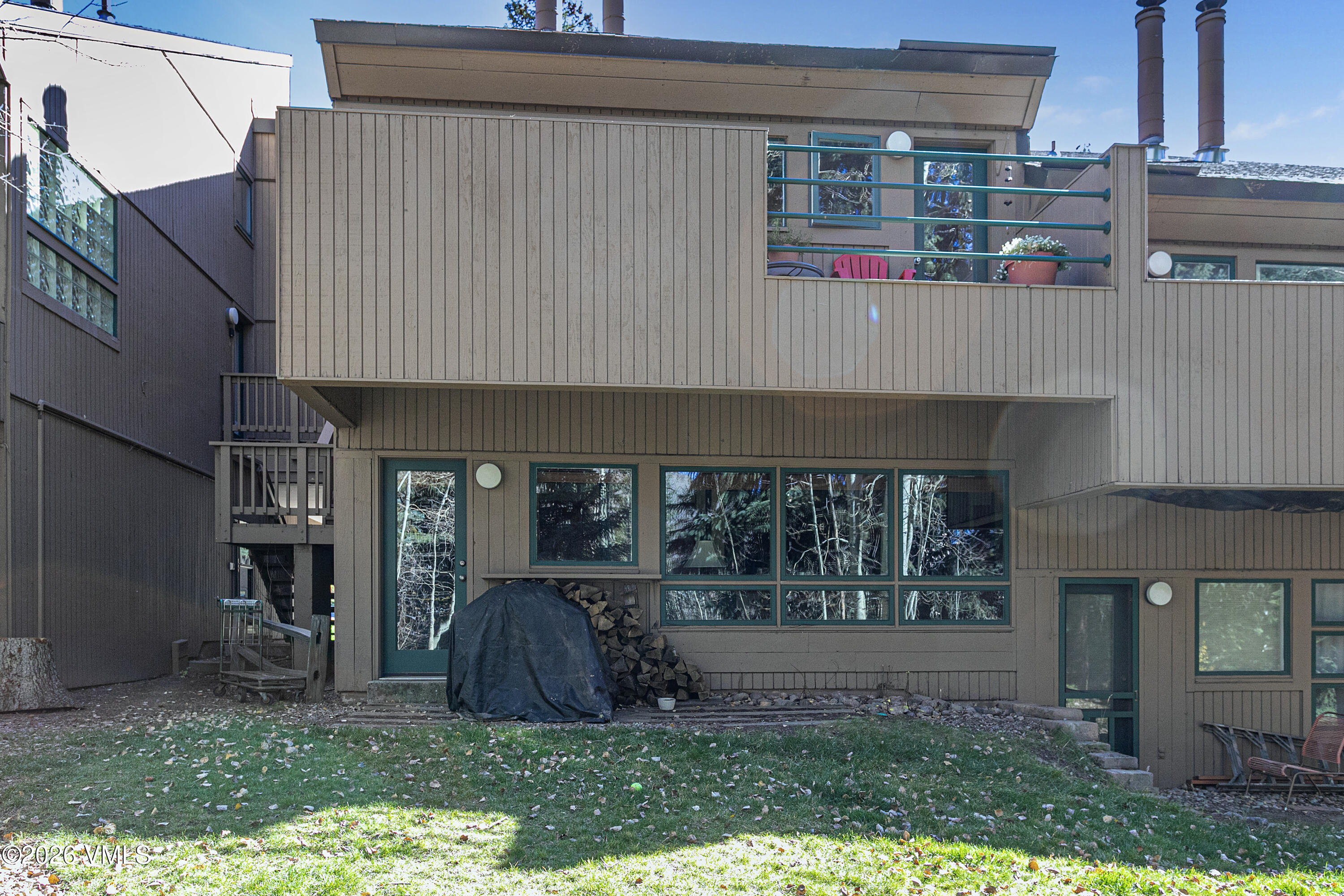 3911 Big Horn Road, Unit 1B Vail, CO 81657 - Photo 19 of 29 a front view of a house with garden