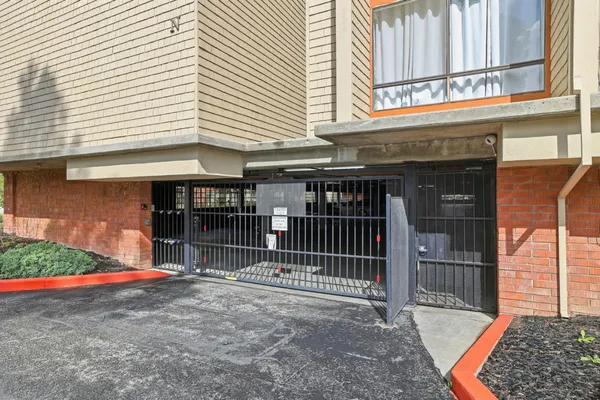 a house with swimming pool in front of it