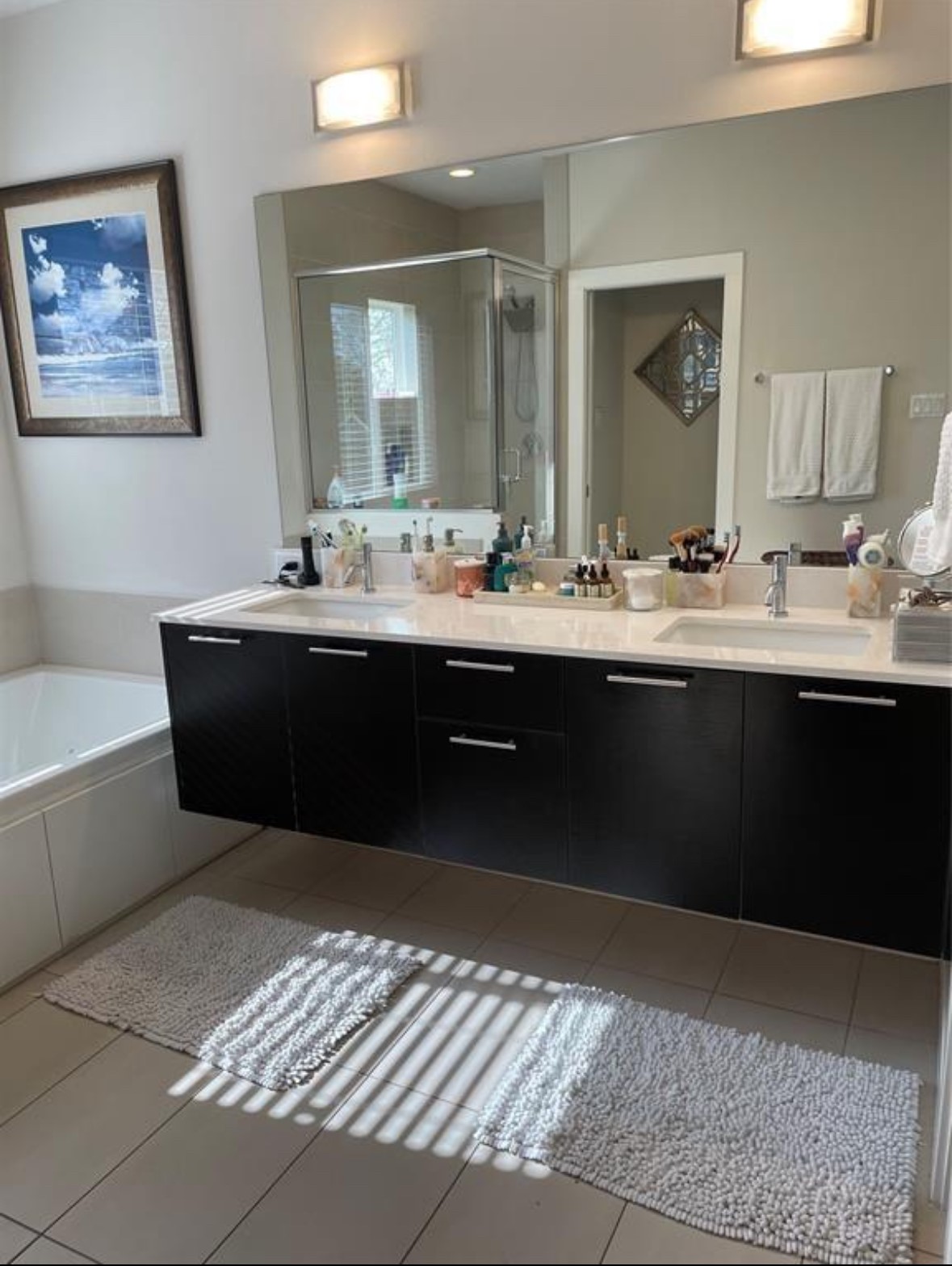 5204 Hershe Street, Unit B Houston, TX 77020 - Photo 9 of 11 a room with a sink and a mirror