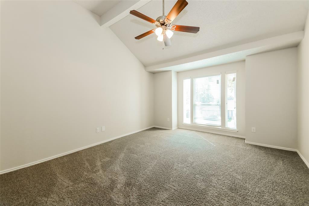 3511 Jasmine Lane Rowlett, TX 75089 - Photo 16 of 27 an empty room with a window and a fan