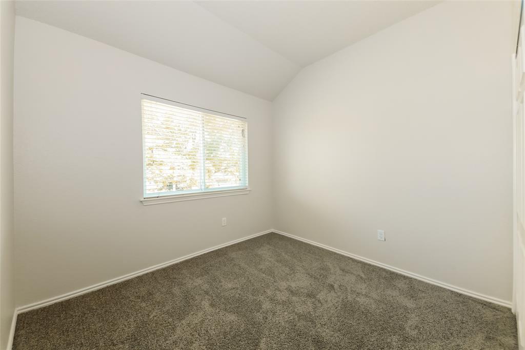 3511 Jasmine Lane Rowlett, TX 75089 - Photo 22 of 27 an empty room with a window
