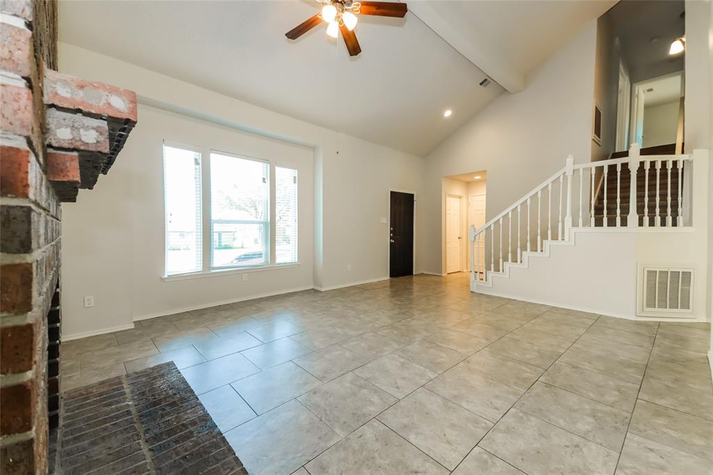 3511 Jasmine Lane Rowlett, TX 75089 - Photo 8 of 27 a view of livingroom with hardwood floor and a ceiling fan