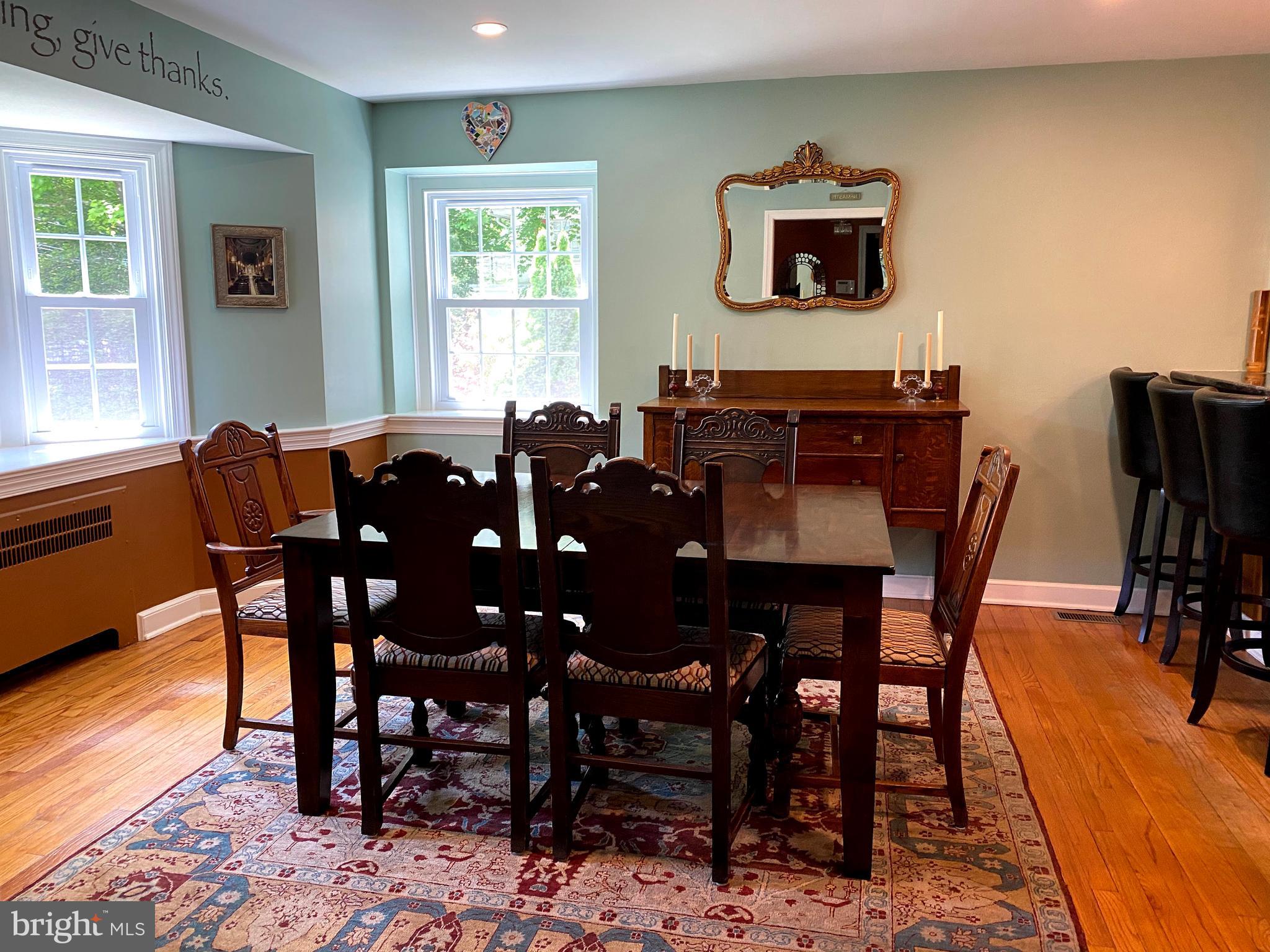 1201 Knox Road Wynnewood, PA 19096 - Photo 18 of 49 a view of a dining room with furniture and wooden floor