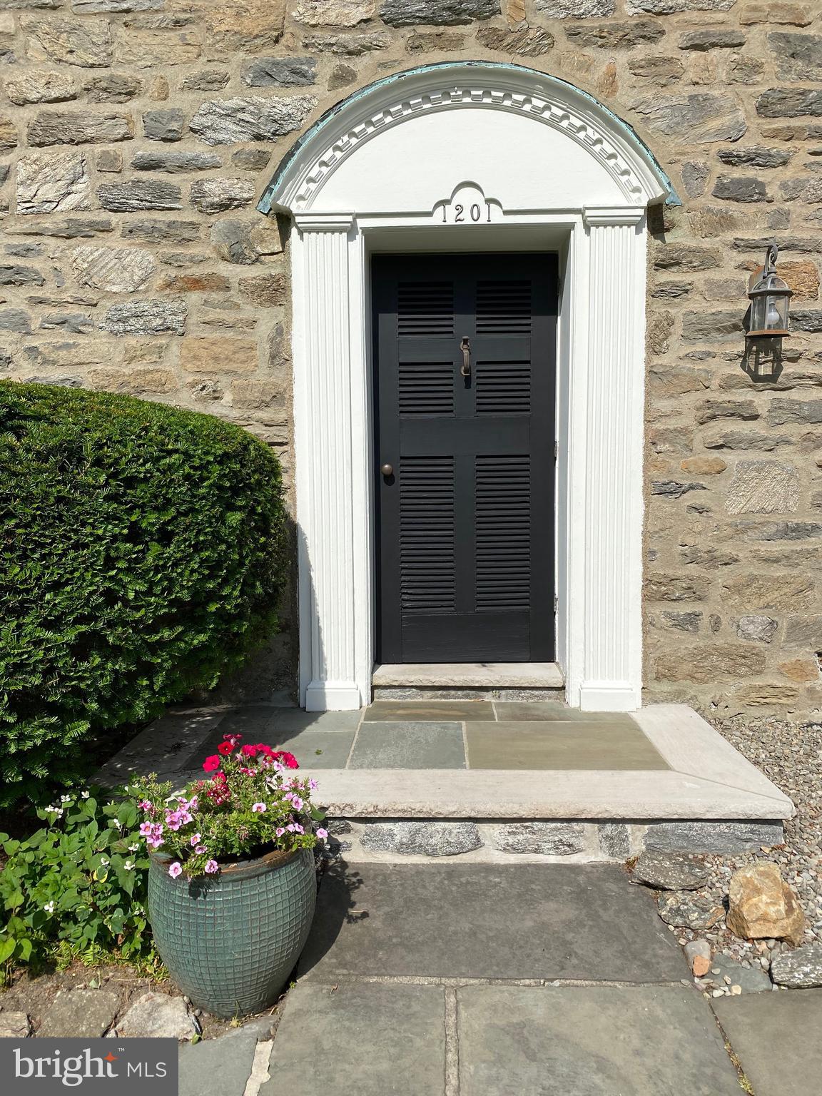 1201 Knox Road Wynnewood, PA 19096 - Photo 3 of 49 a view of a wooden door of the house