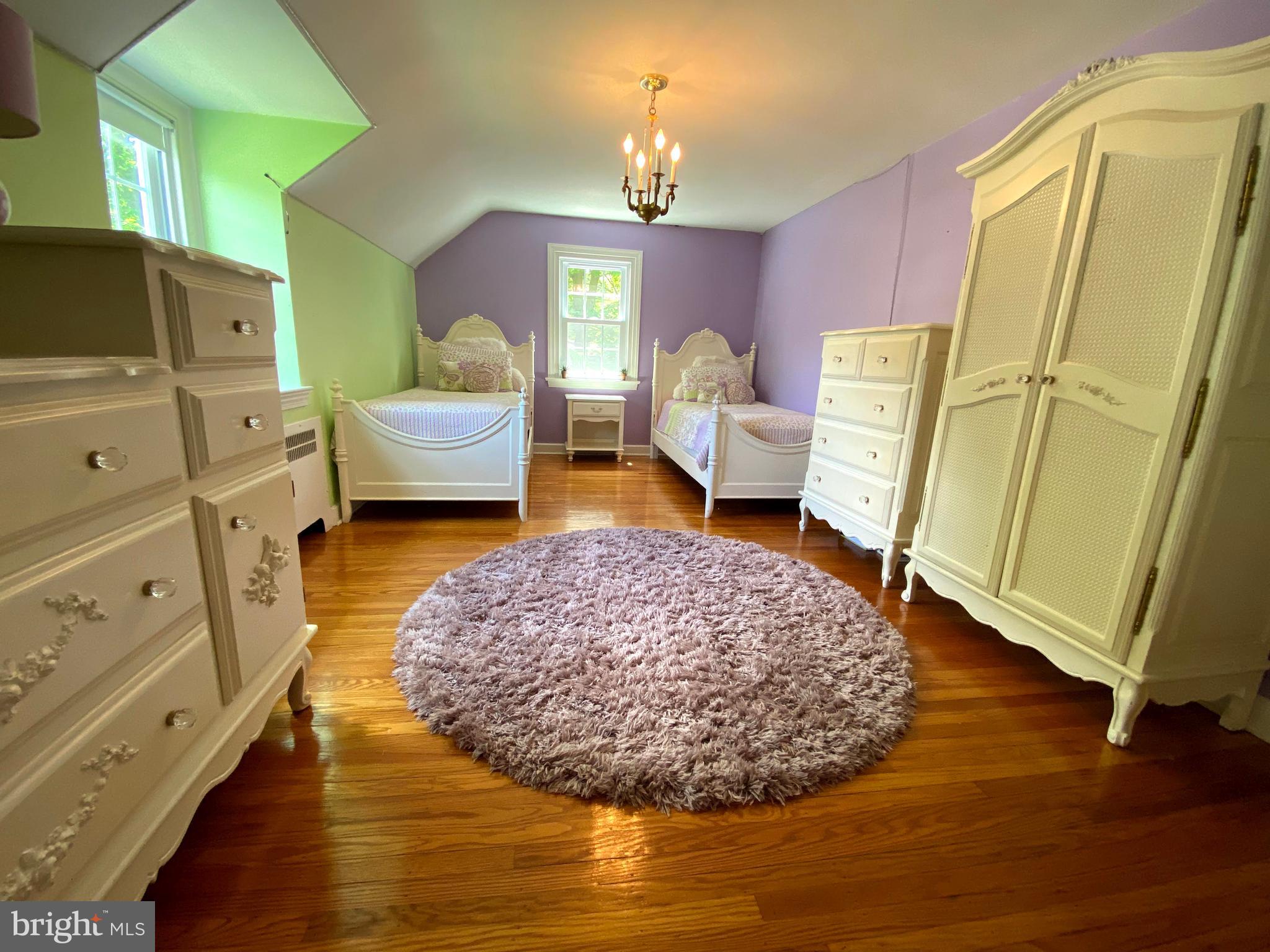 1201 Knox Road Wynnewood, PA 19096 - Photo 36 of 49 a spacious bedroom with a bed dresser and a window
