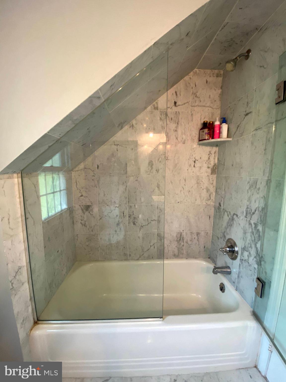 1201 Knox Road Wynnewood, PA 19096 - Photo 38 of 49 a bathroom with a bathtub
