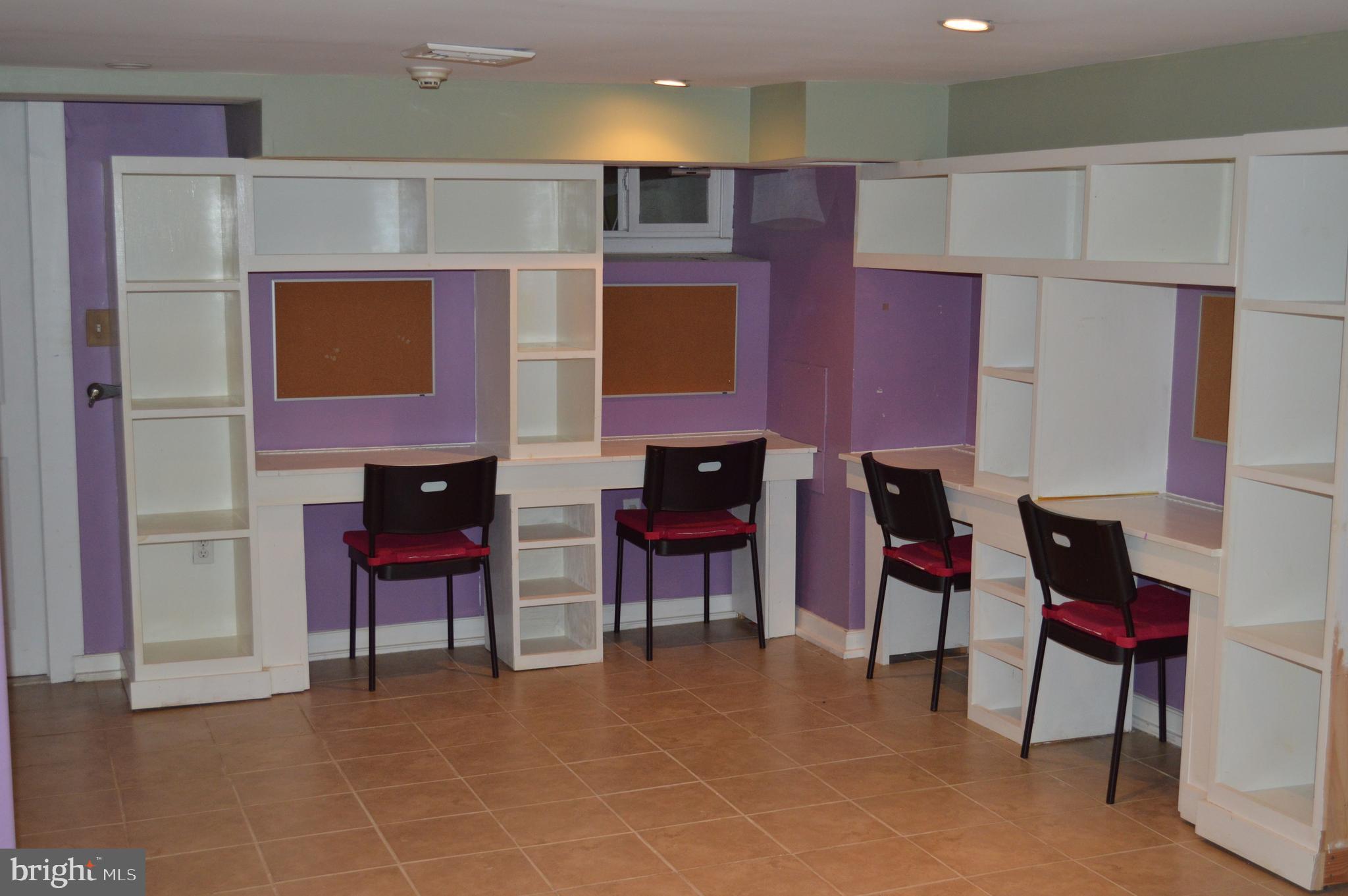 1201 Knox Road Wynnewood, PA 19096 - Photo 43 of 49 a view of kitchen with furniture and a fireplace