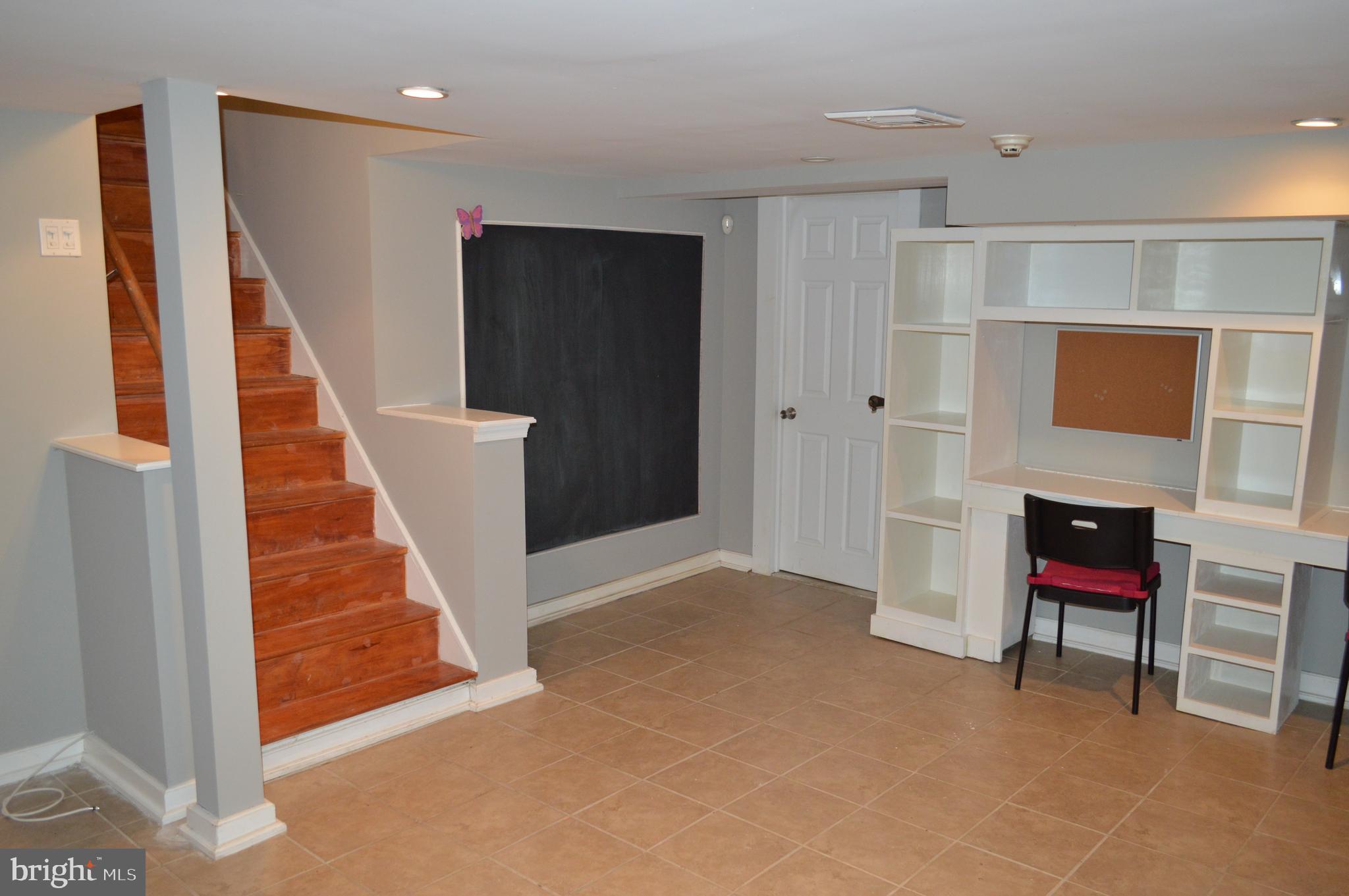1201 Knox Road Wynnewood, PA 19096 - Photo 45 of 49 a view of a livingroom with furniture and staircase