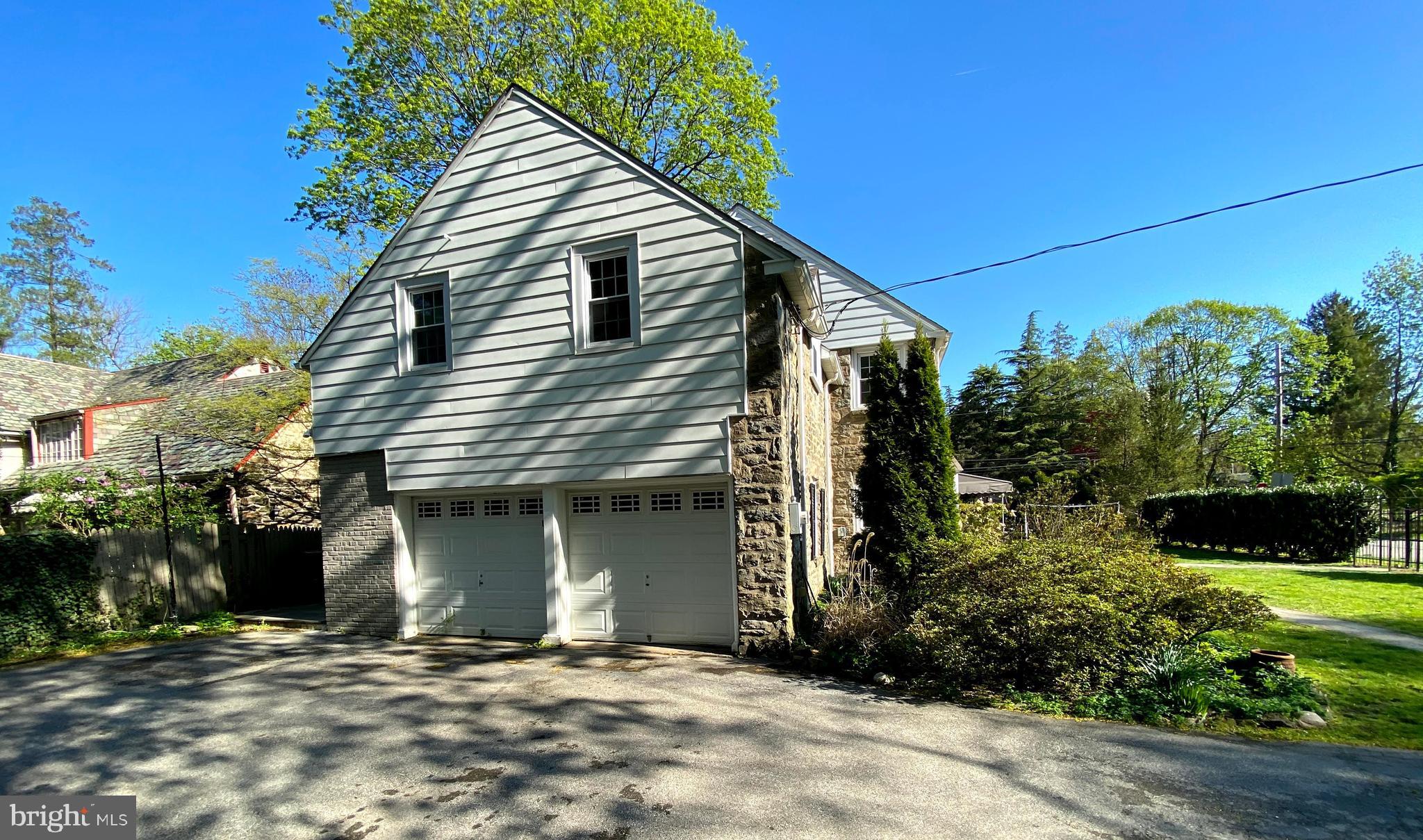 1201 Knox Road Wynnewood, PA 19096 - Photo 7 of 49 a view of a house with a yard