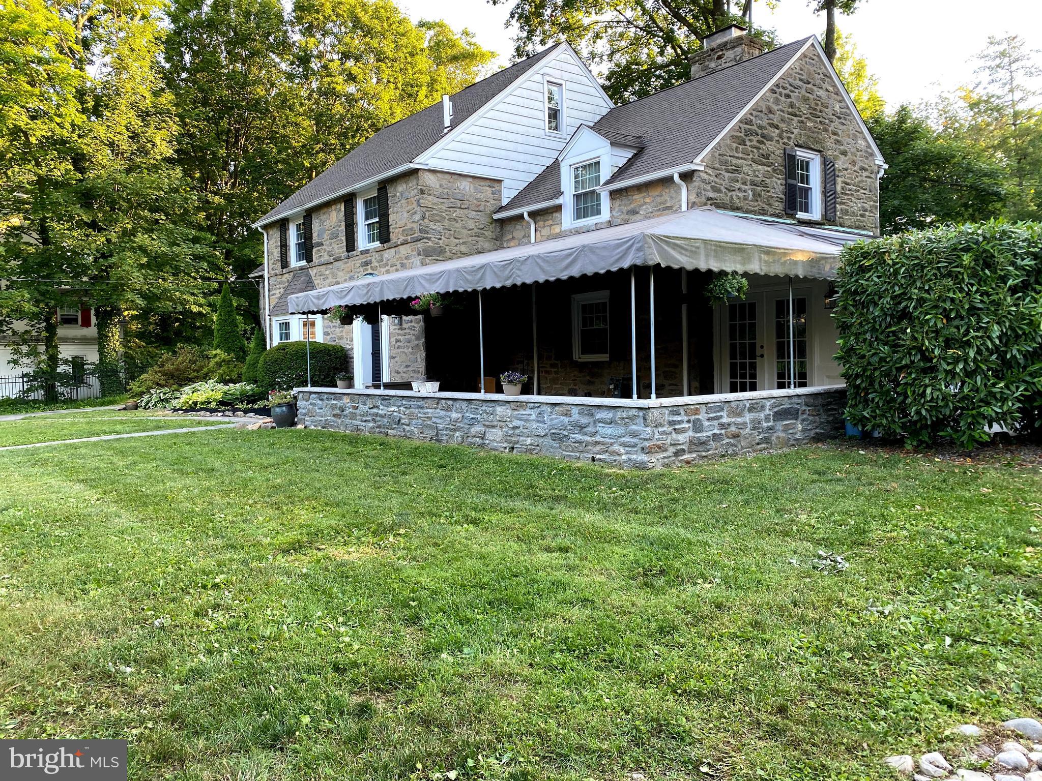 1201 Knox Road Wynnewood, PA 19096 - Photo 8 of 49 a view of a house with garden and yard