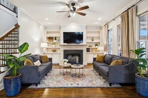 a kitchen with stainless steel appliances granite countertop a refrigerator and microwave
